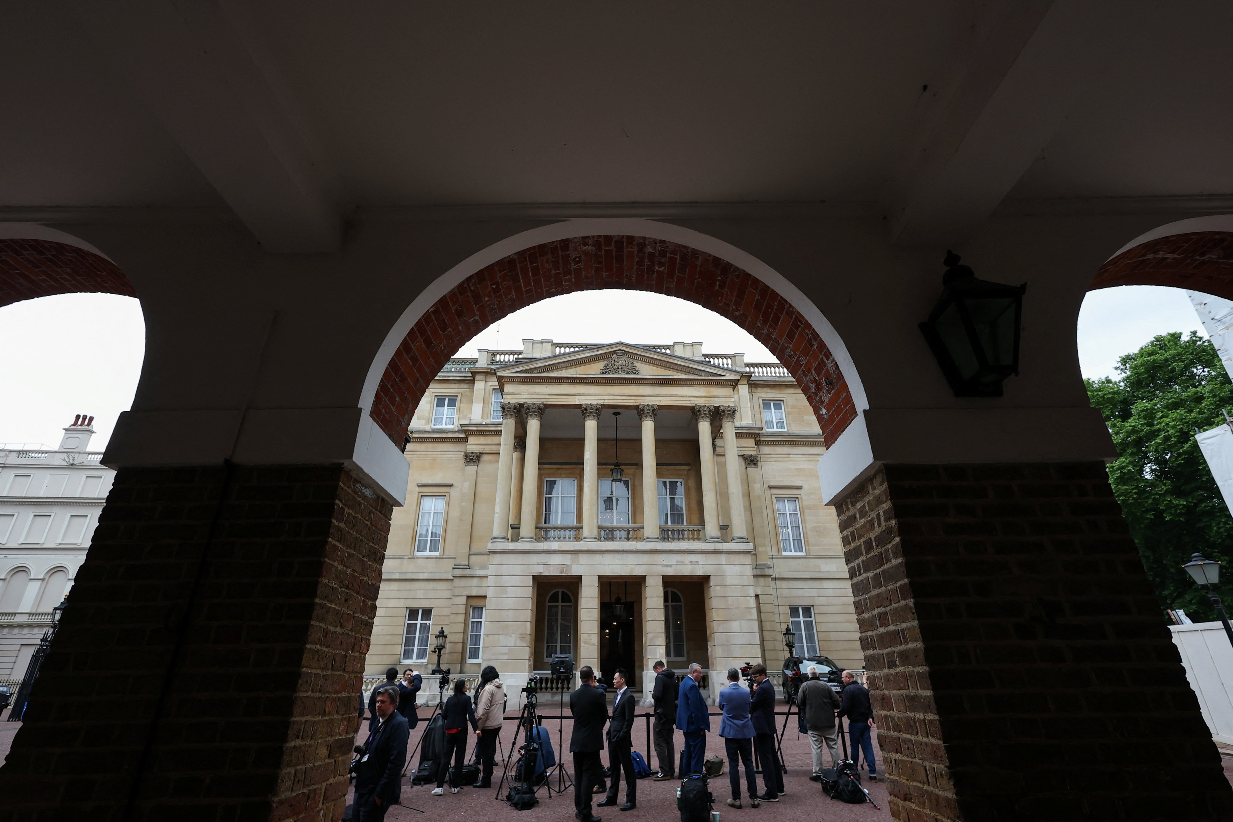 Journalists waiting outside Lancaster House. Photo: Reuters