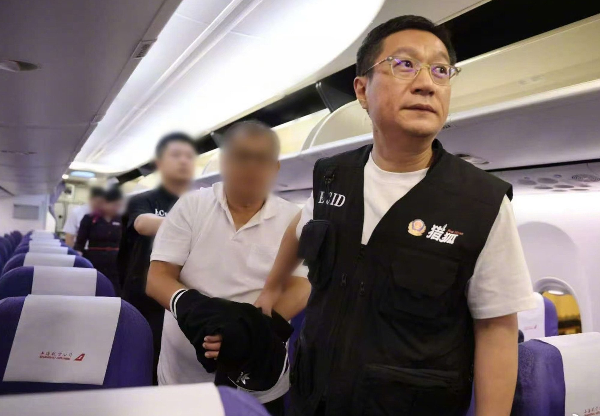 Tedy Teow being extradited to China on August 20, last year. Photo: Ministry of Public Security