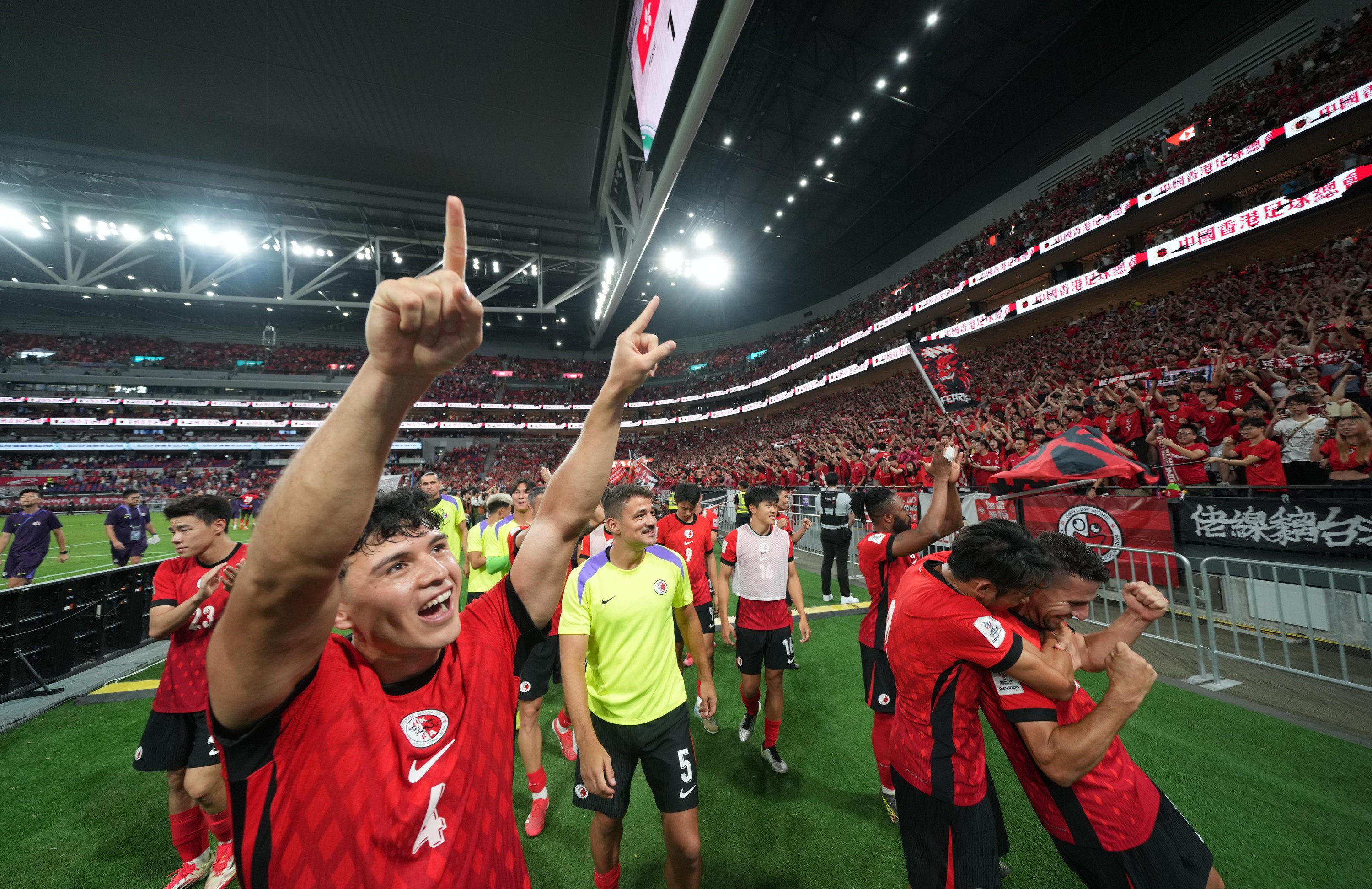 Hong Kong players celebrate beating India at Kai Tak Stadium on Tuesday. Photo: Sam Tsang