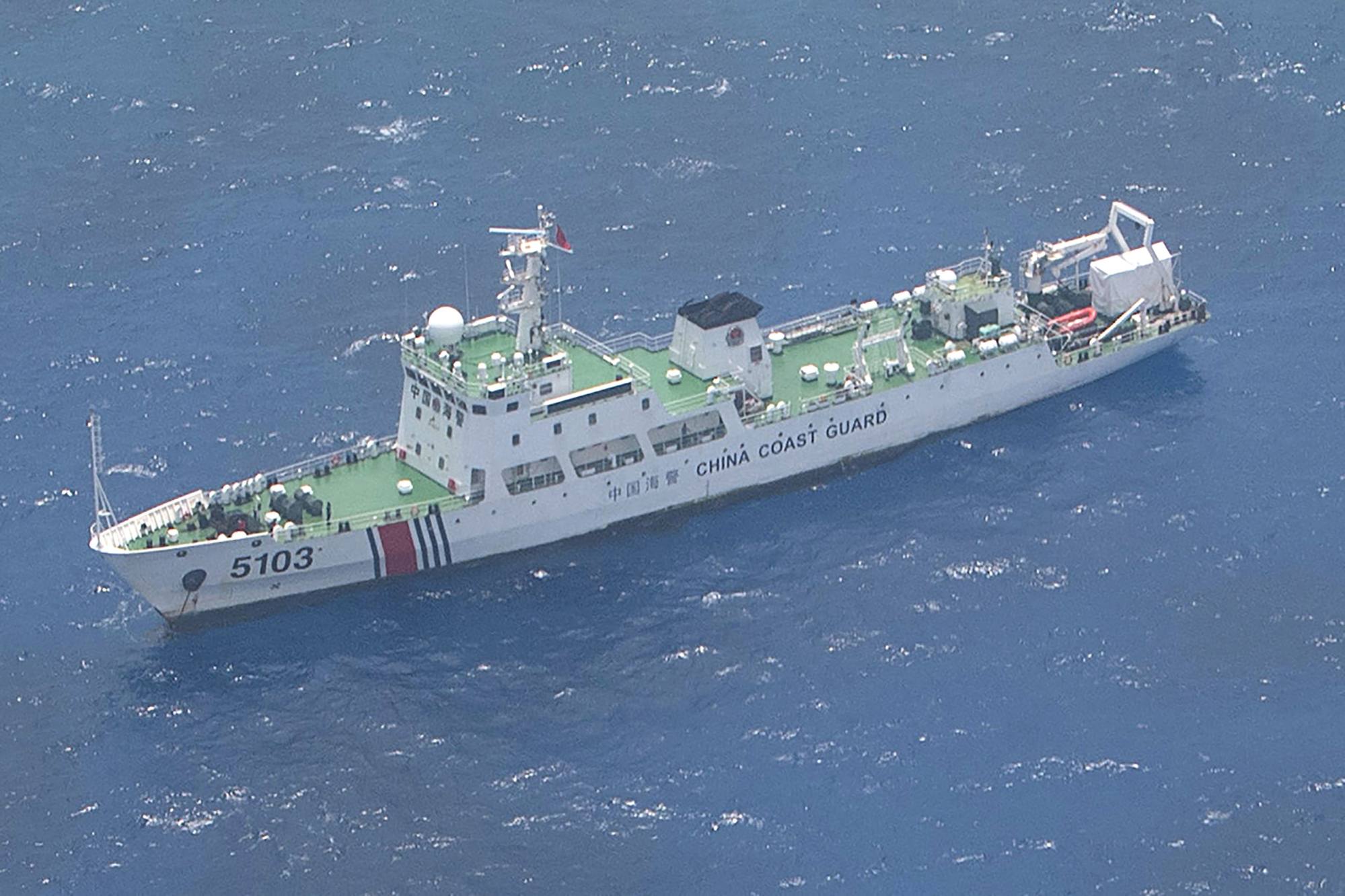 A Chinese coastguard ship seen near the Philippine-occupied Thitu Island in the disputed South China Sea on June 3. Photo: AFP A Chinese coastguard ship seen near the Philippine-occupied Thitu Island in the disputed South China Sea on June 3. Photo: AFP