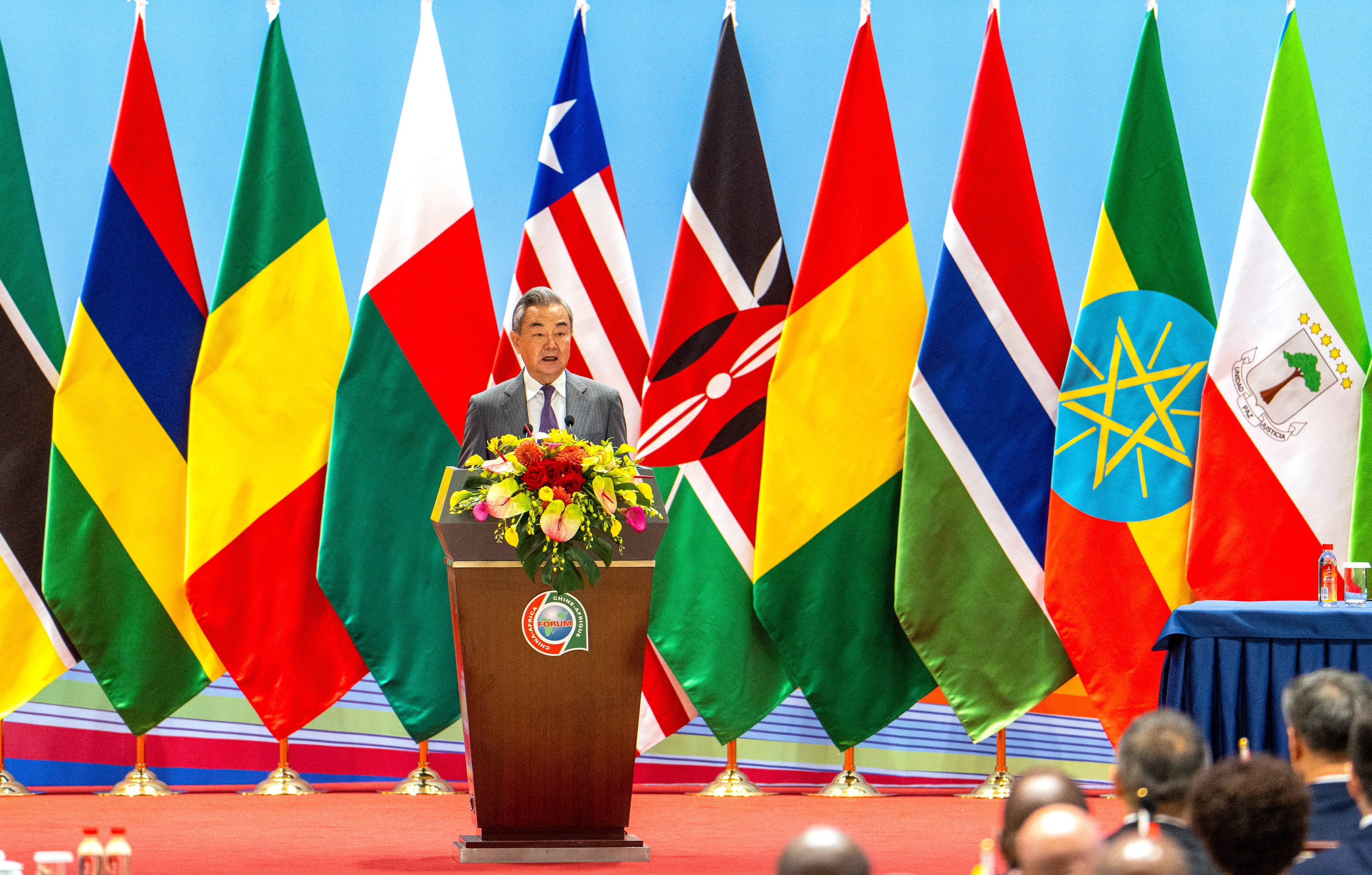 Chinese Foreign Minister Wang Y reads a letter from President Xi Jinping to a FOCAC meeting in Changsha on Wednesday. Representatives of China, 53 African countries and the African Union Commission attended the meeting. Photo: Xinhua