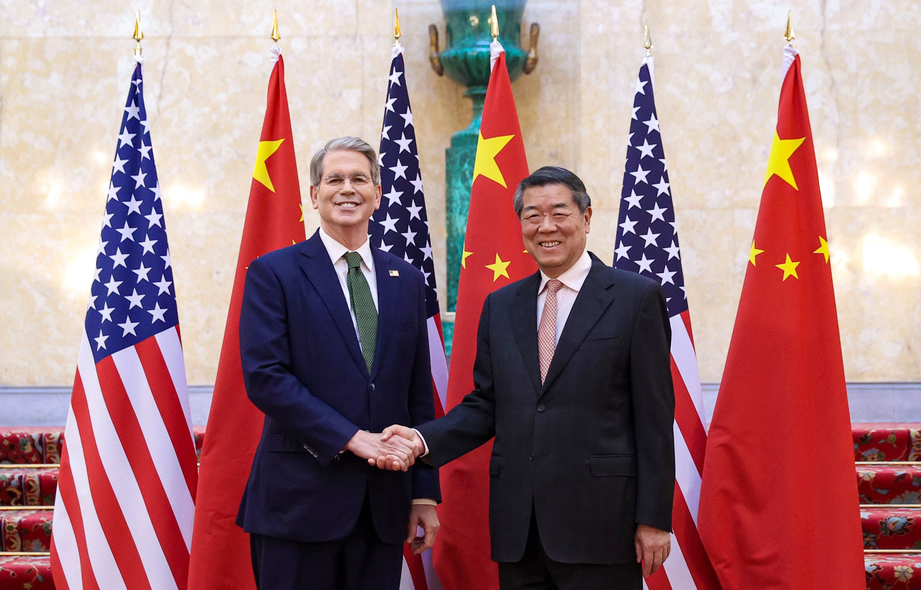 Chinese Vice-Premier He Lifeng shakes hands with US Treasury Secretary Scott Bessent during a two-day meeting in London. Photo: Xinhua