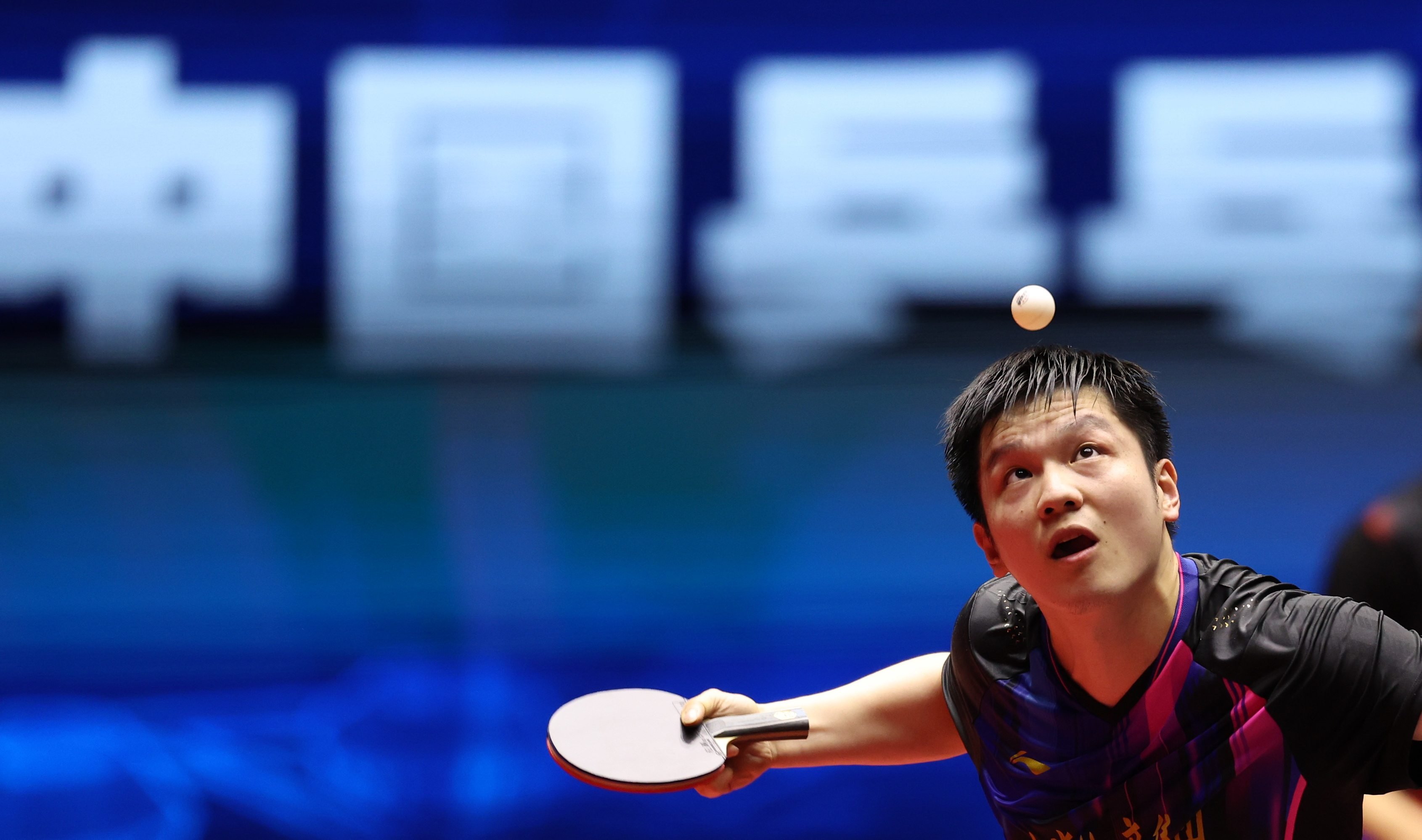 Fan Zhendong serves against Lin Shidong at the China Table Tennis Super League event in Hebei. Photo: Xinhua
