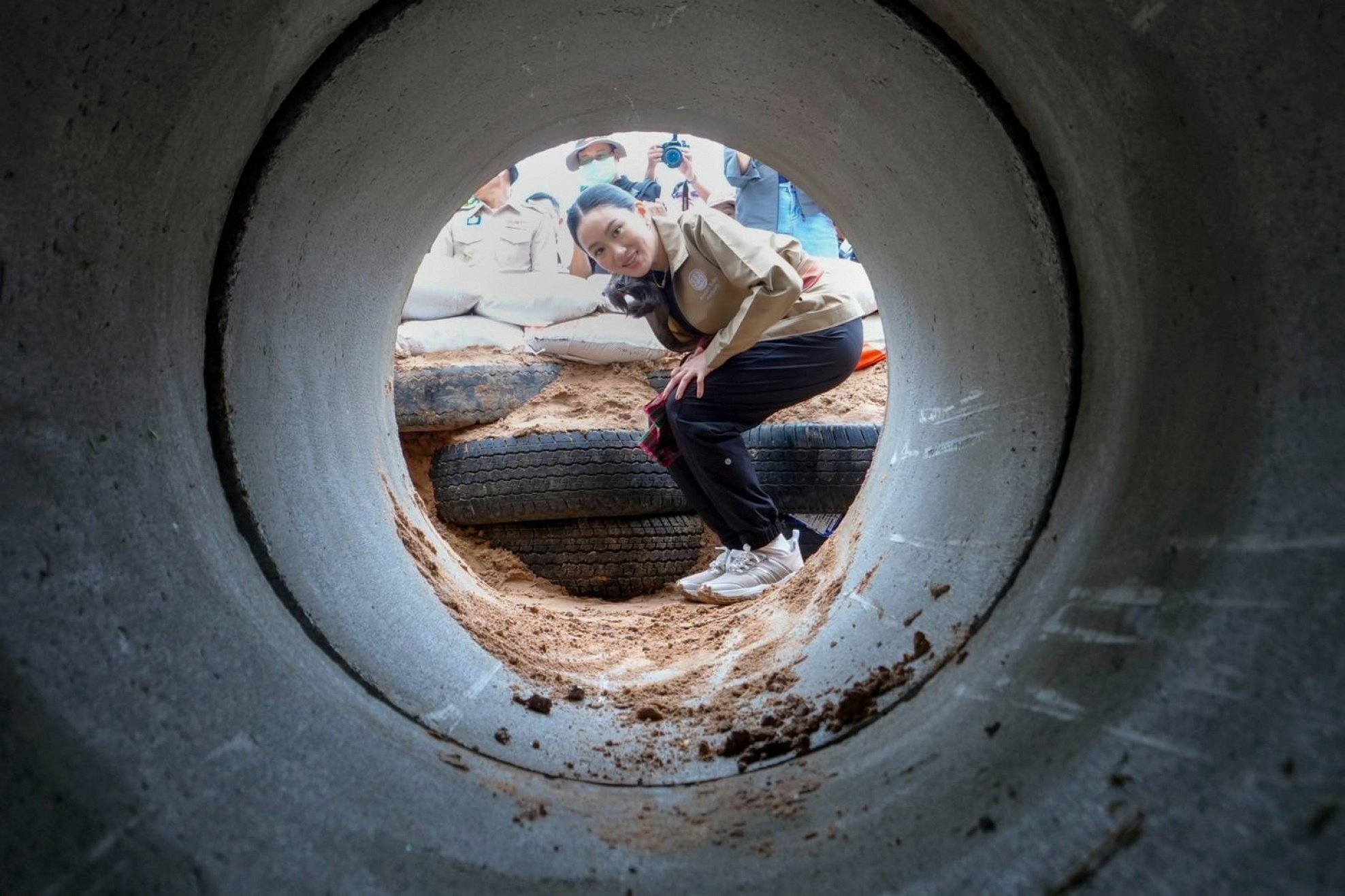 Thai Prime Minister Paetongtarn Shinawatra inspects a bomb shelter, built by villagers, during a trip to the Kap Choeng border district on Wednesday. Photo: Thai Government Handout/EPA-EFE