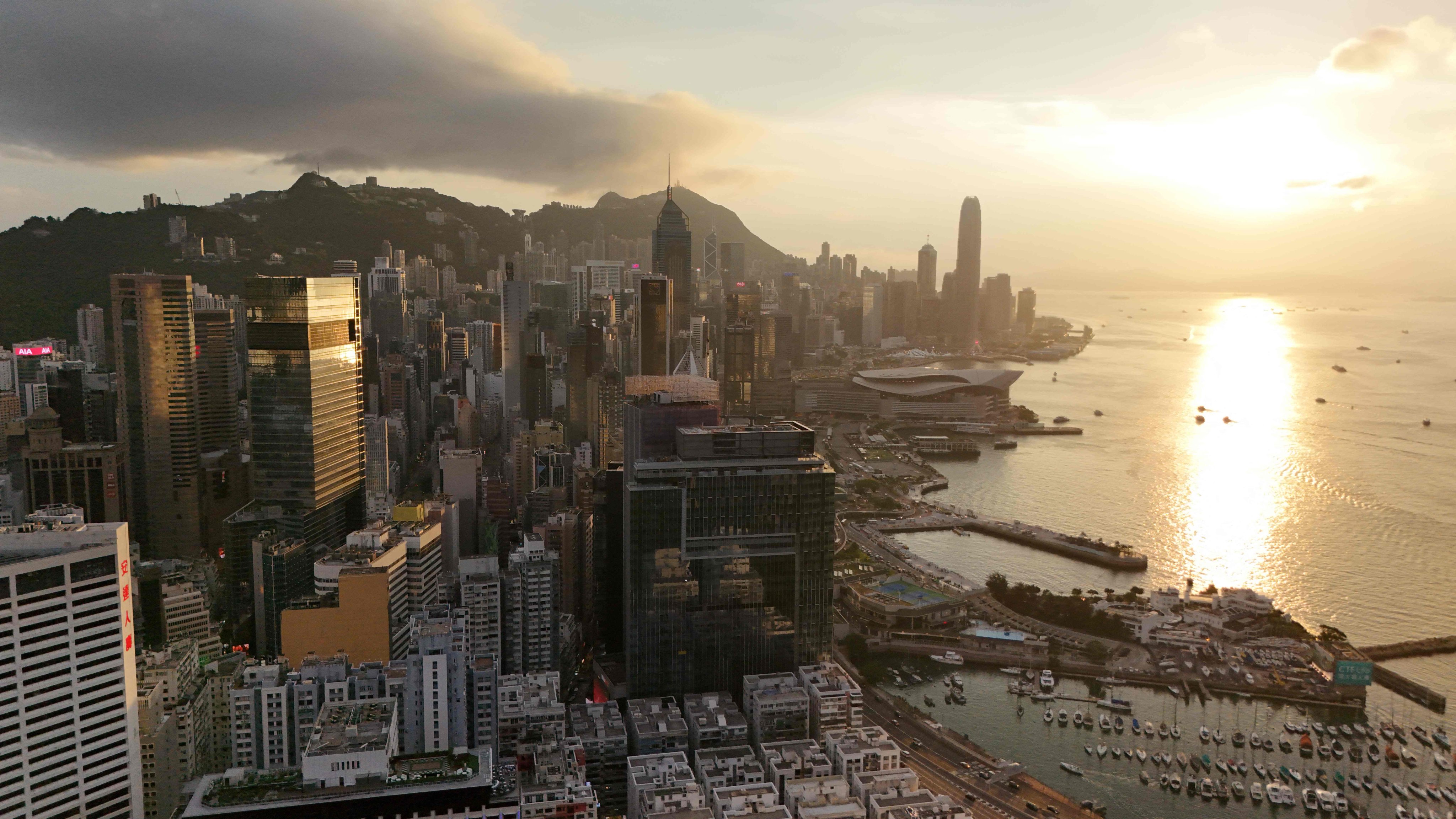 A view of Hong Kong Island and Victoria Harbour at sunset on May 19. The historic ties between London and Hong Kong provide a strong foundation for a consistent, clear and ambitious services relationship between China and the UK. Photo: AFP