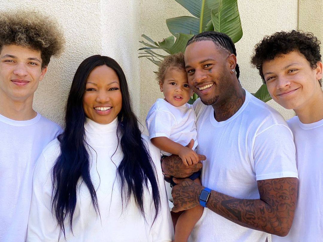 Garcelle Beauvais with her three sons – Oliver, Jax and Jaid – and grandson, Oliver Jr. Photo: @iamoliversaunders/Instagram