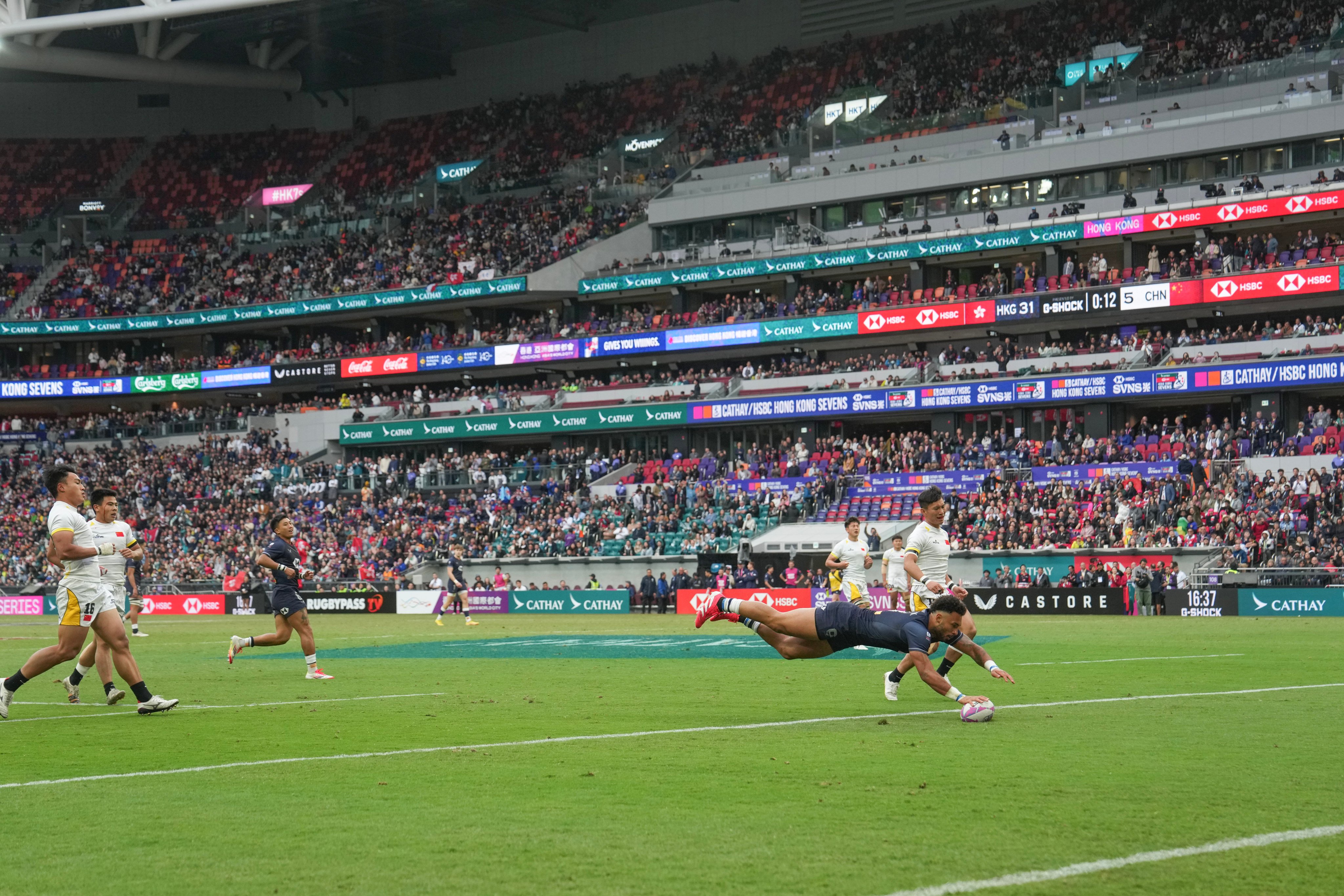 Max Denmark scores one of a hattrick of tries against China at the Hong Kong Sevens at Kai Tak Stadium in March. Photo: Elson Li