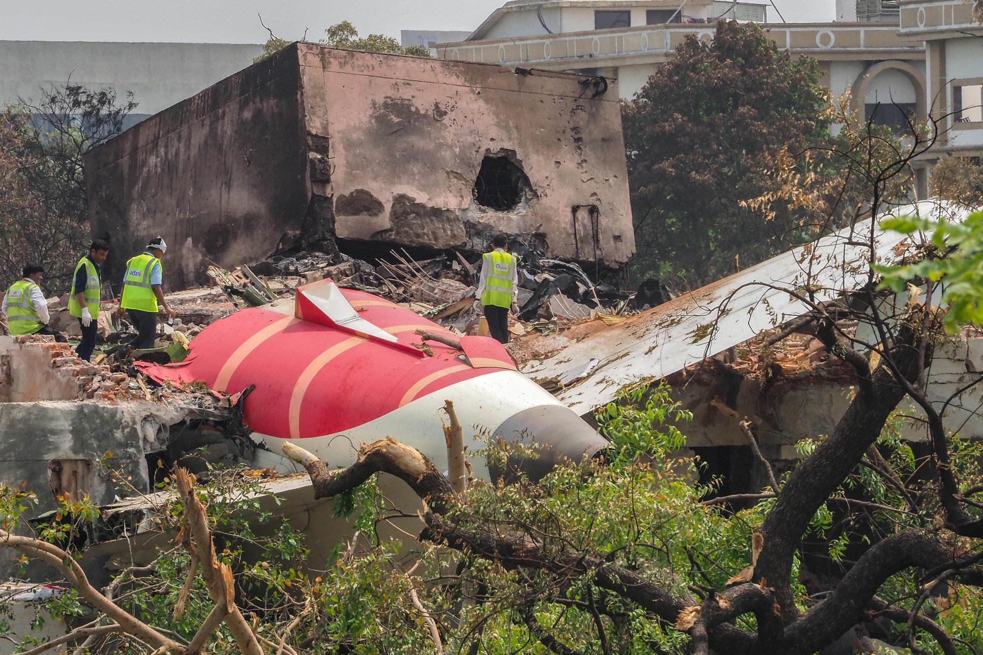 An investigation team inspects the wreckage of Air India flight 171, a day after it crashed in a residential area in Ahmedabad. Photo: AFP An investigation team inspects the wreckage of Air India flight 171, a day after it crashed in a residential area in Ahmedabad. Photo: AFP