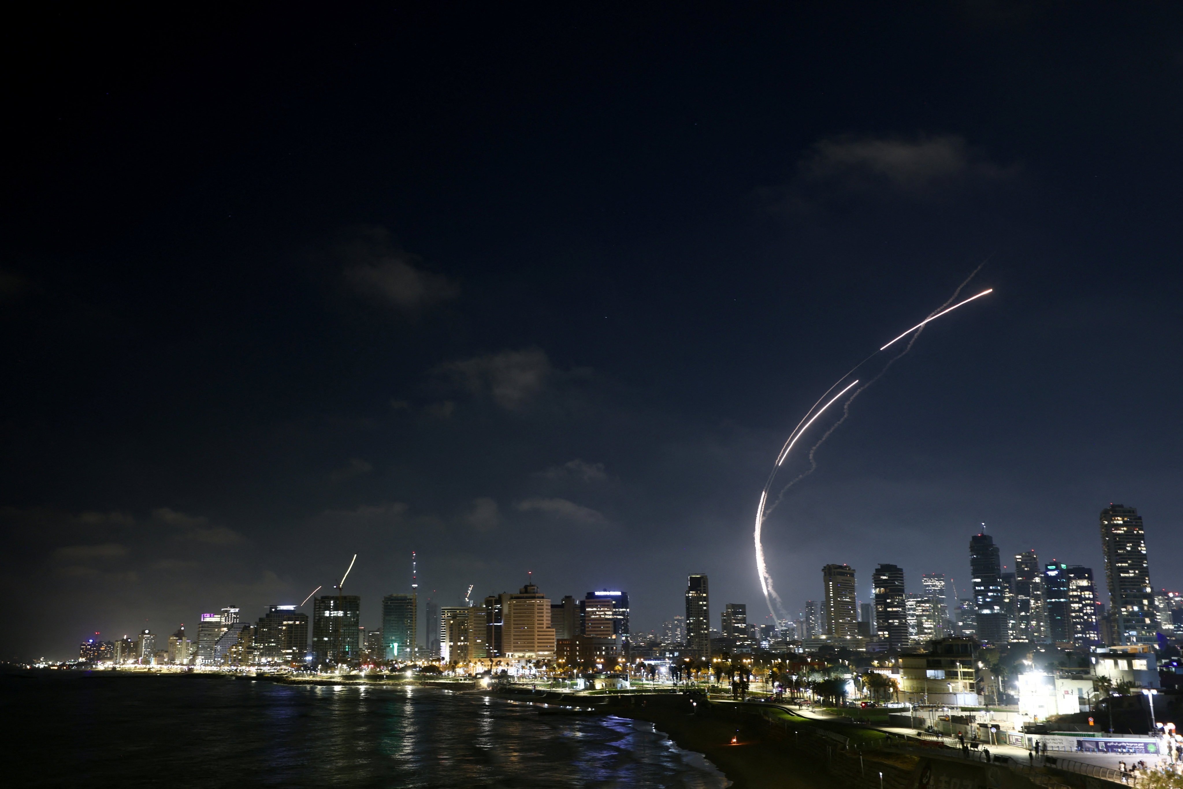 Missiles launched from Iran are intercepted as seen from Tel Aviv, Israel, on Friday. Photo: Reuters