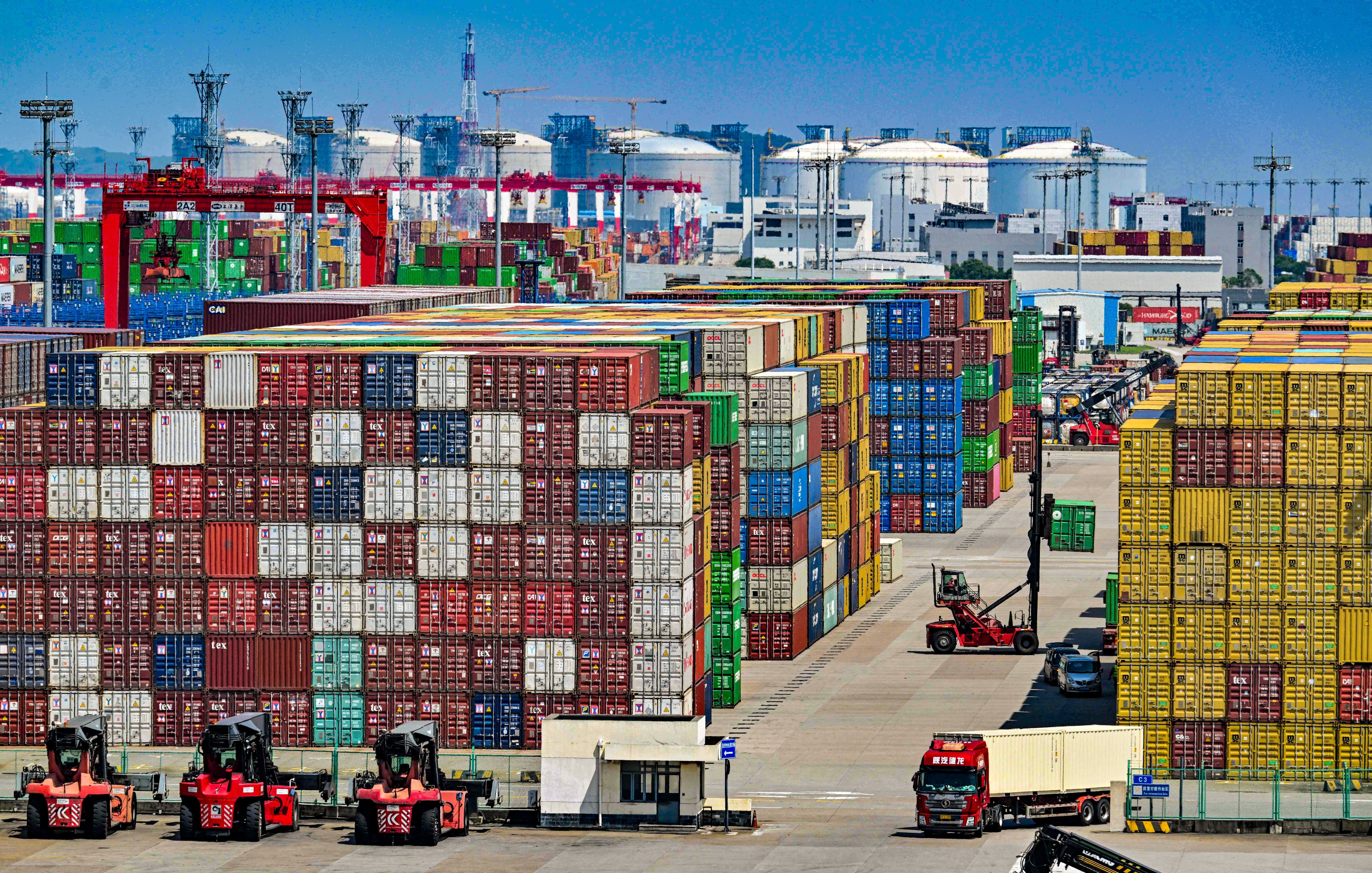 Containers are stacked in a port near Shanghai in eastern China. The trade war continued to weigh on China’s exports in May, despite Beijing and Washington agreeing a deal to roll back tariffs. Photo: AFP