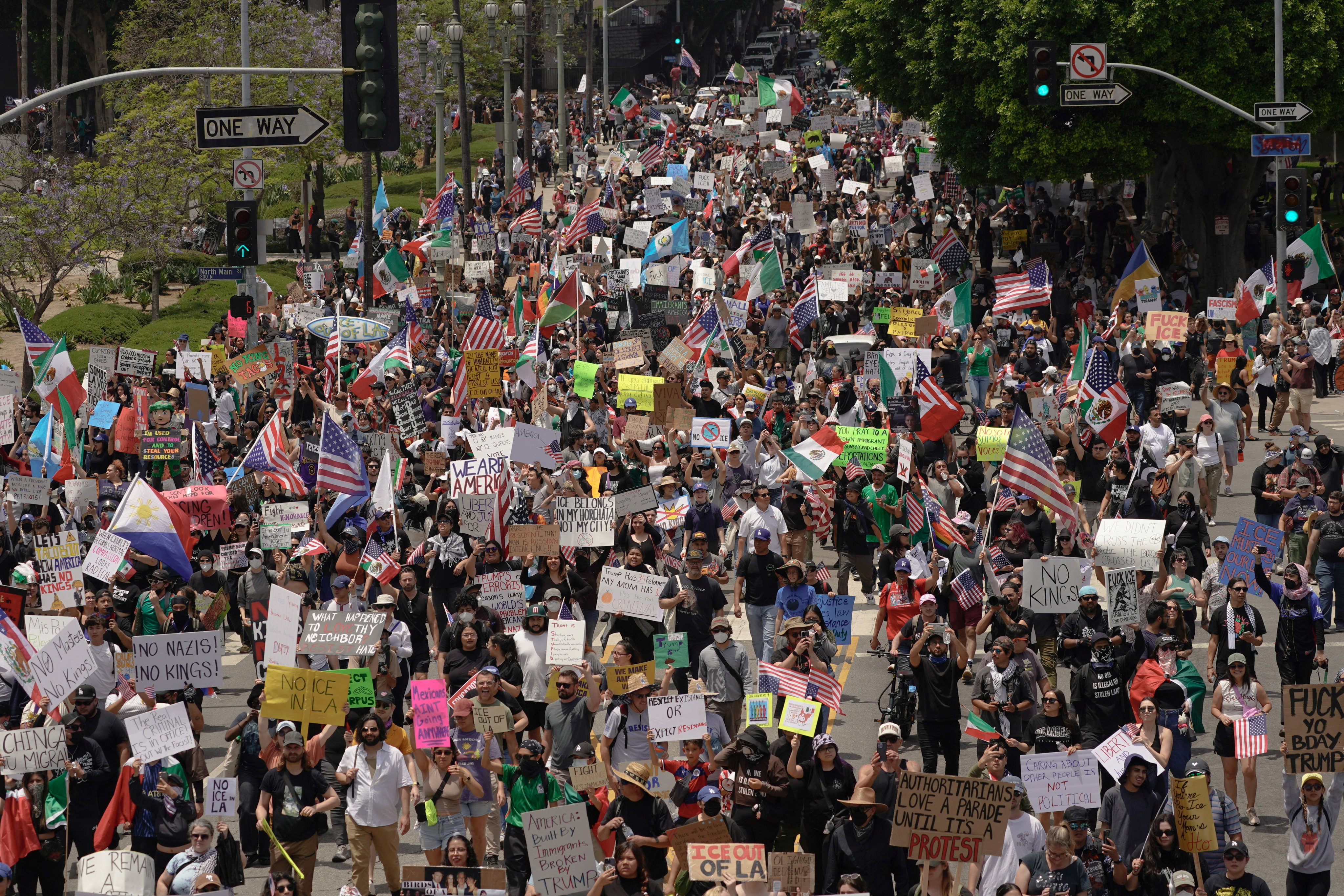 Protesters rally against US President Donald Trump’s policies and federal immigration sweeps during a demonstration in Los Angeles on Saturday. Photo: Reuters