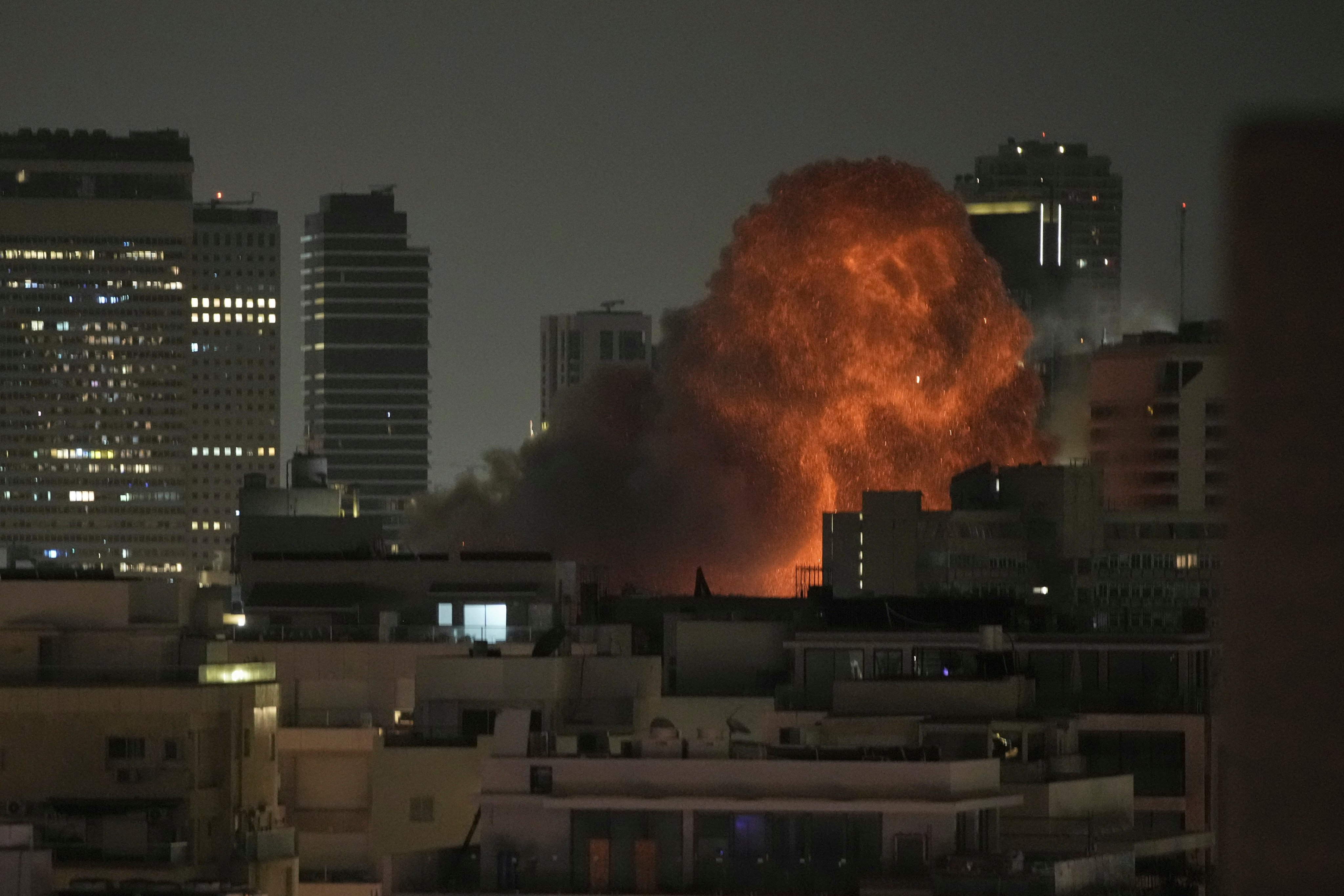 An explosion from a missile attack on Tel Aviv, Israel, on Sunday. Photo: AP