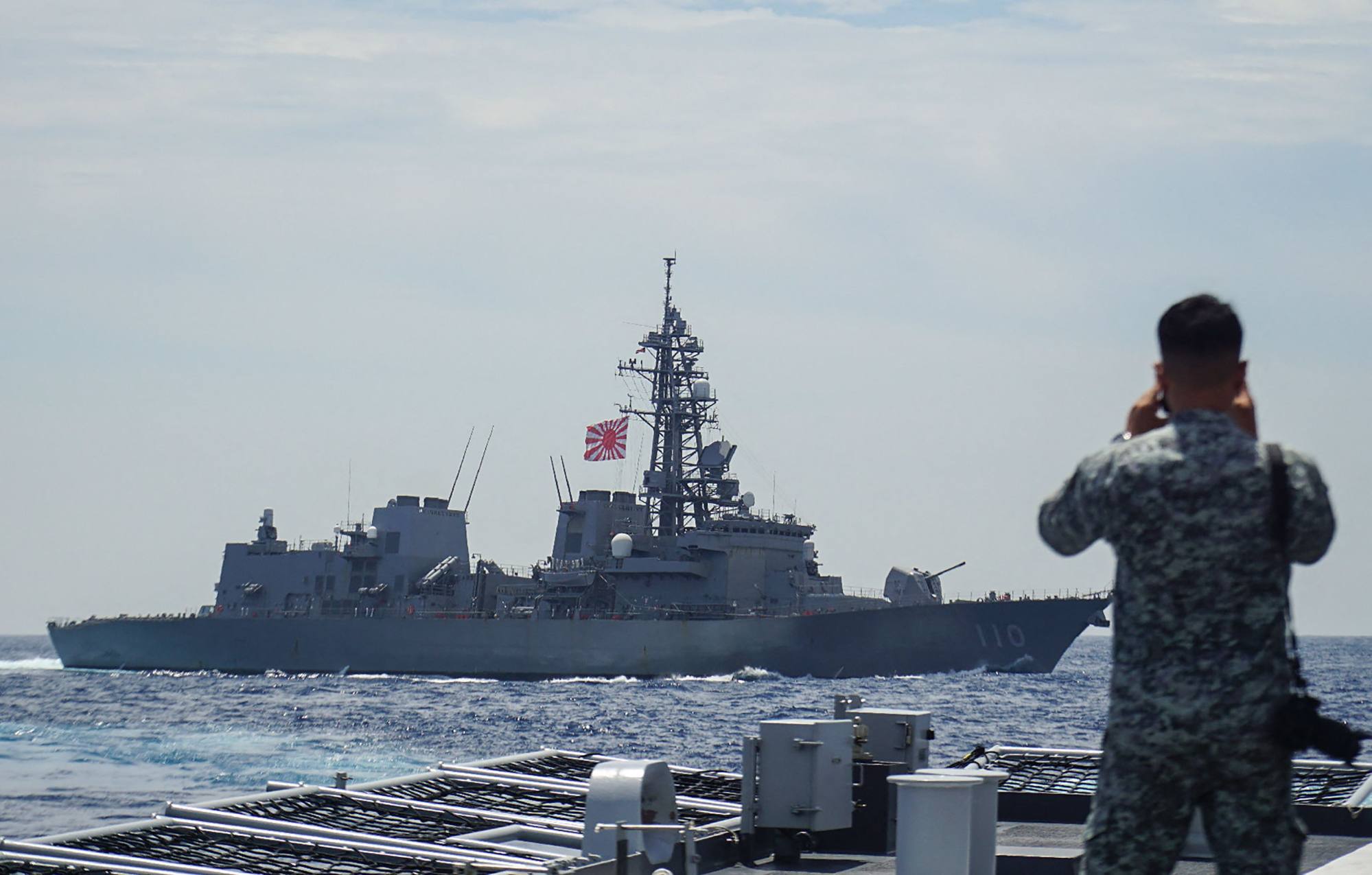 A member of the Philippine Navy looks out at the Japan Maritime Self-Defence Force’s destroyer Takanami during a joint maritime exercise in the South China Sea on June 14. Photo: Jiji Press / AFP A member of the Philippine Navy looks out at the Japan Maritime Self-Defence Force’s destroyer Takanami during a joint maritime exercise in the South China Sea on June 14. Photo: Jiji Press / AFP