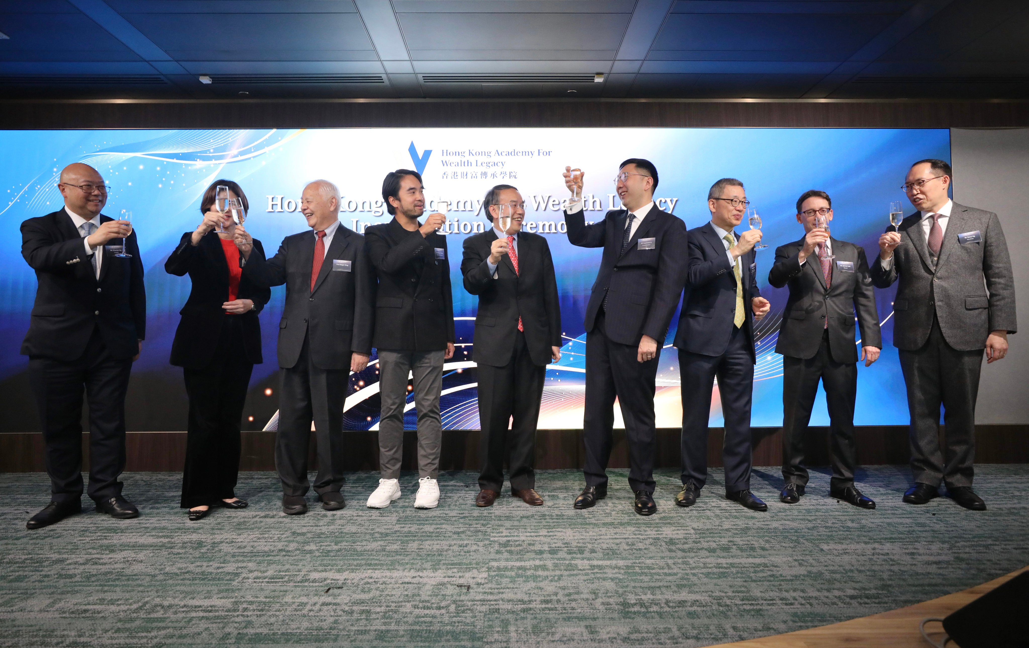Adrian Cheng (fourth from left), chairman of the Hong Kong Academy for Wealth Legacy (HKAWL), and (fifth from left) Secretary for Financial Services and the Treasury Christopher Hui, at the launch of the academy on November 14, 2023. Photo: Xiaomei Chen