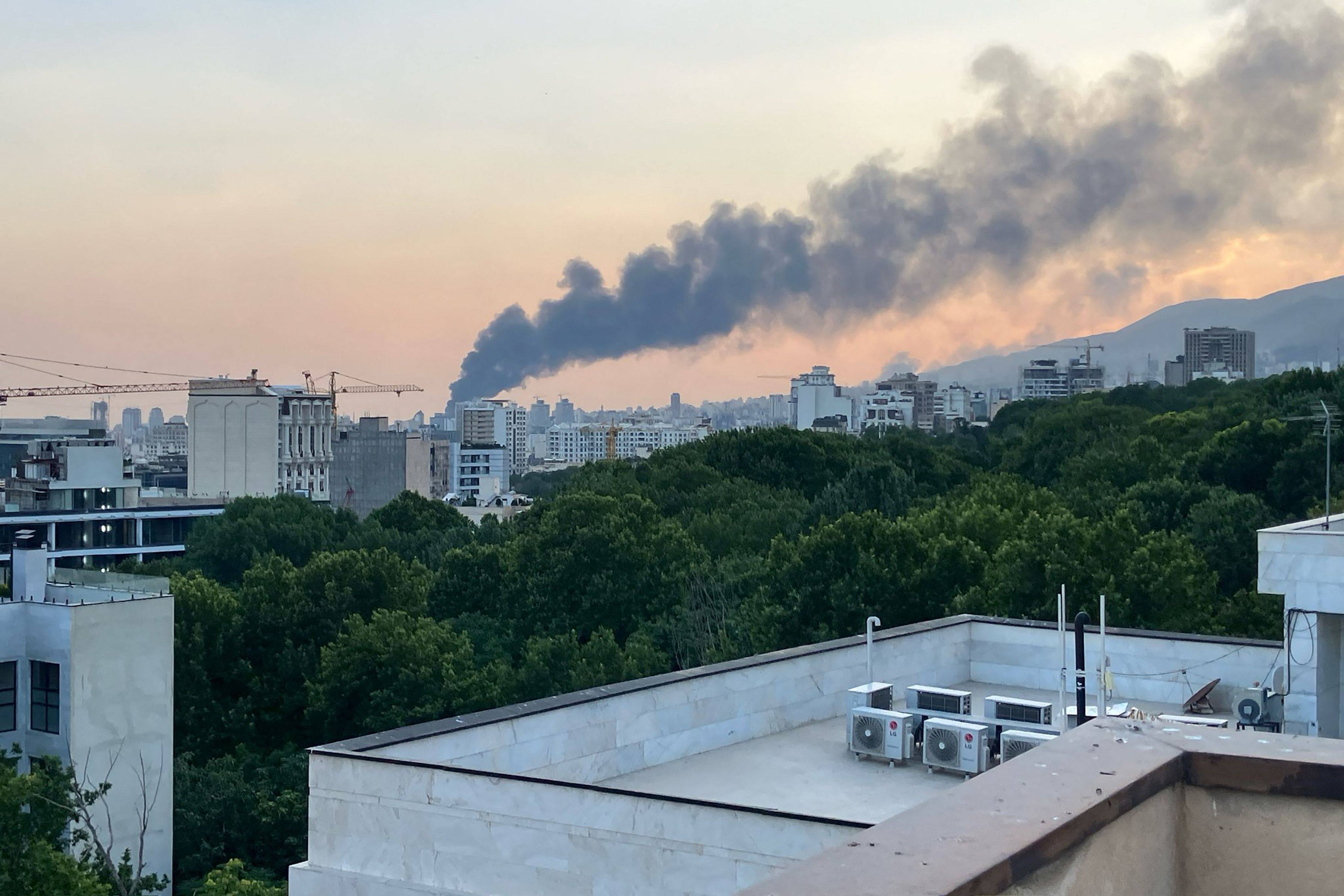 Smoke billows from an explosion at the Islamic Republic of Iran Broadcasting (IRIB) building in Tehran, Iran on Monday. Photo: AFP