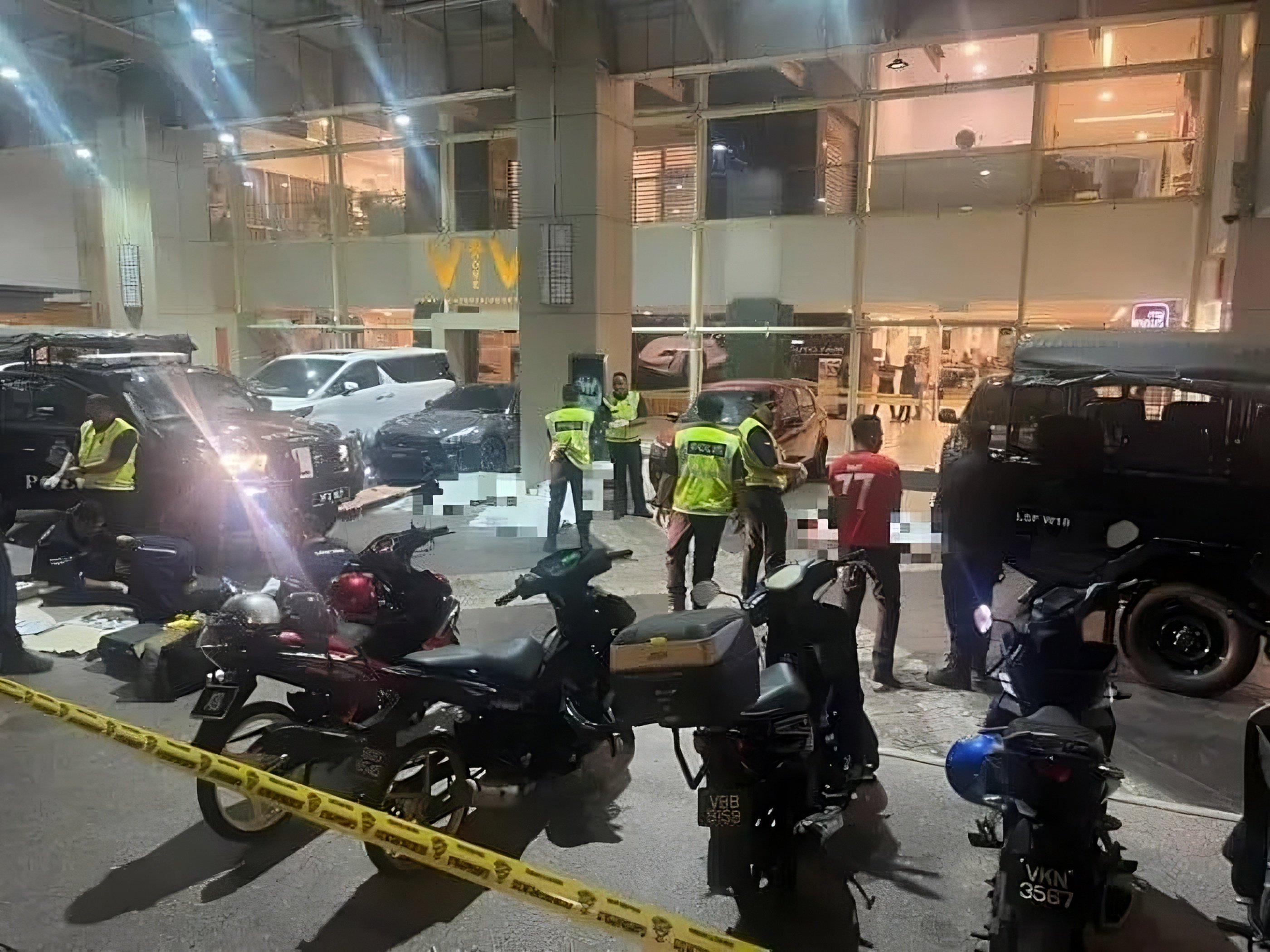 Two men were shot dead near the lobby of a shopping centre in Kuala Lumpur on Tuesday. Photo: The Star