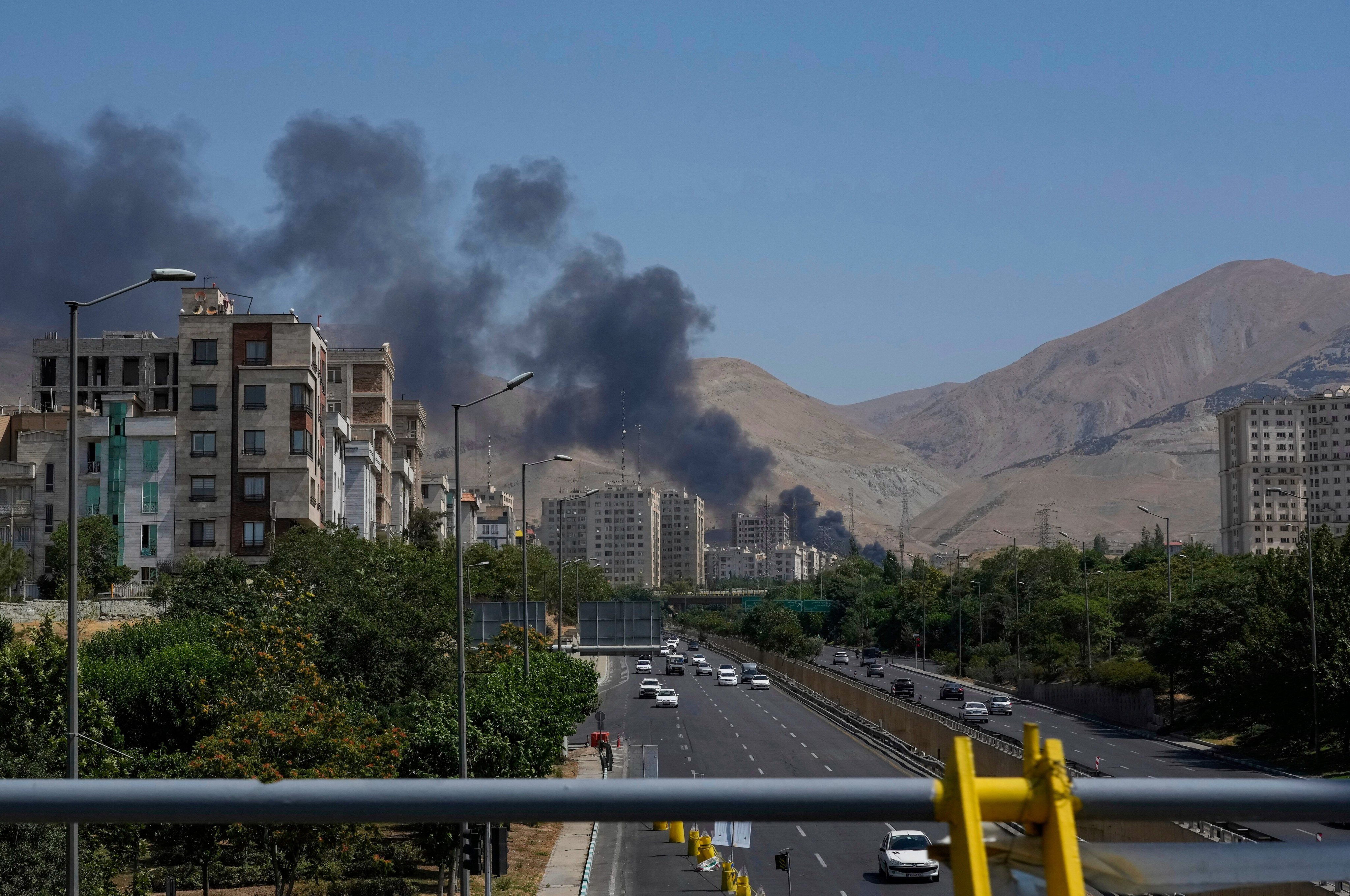 Smoke rises from an oil storage facility after it appeared to have been struck by an Israeli strike on Saturday, in Tehran, Iran, on Monday. Photo: AP