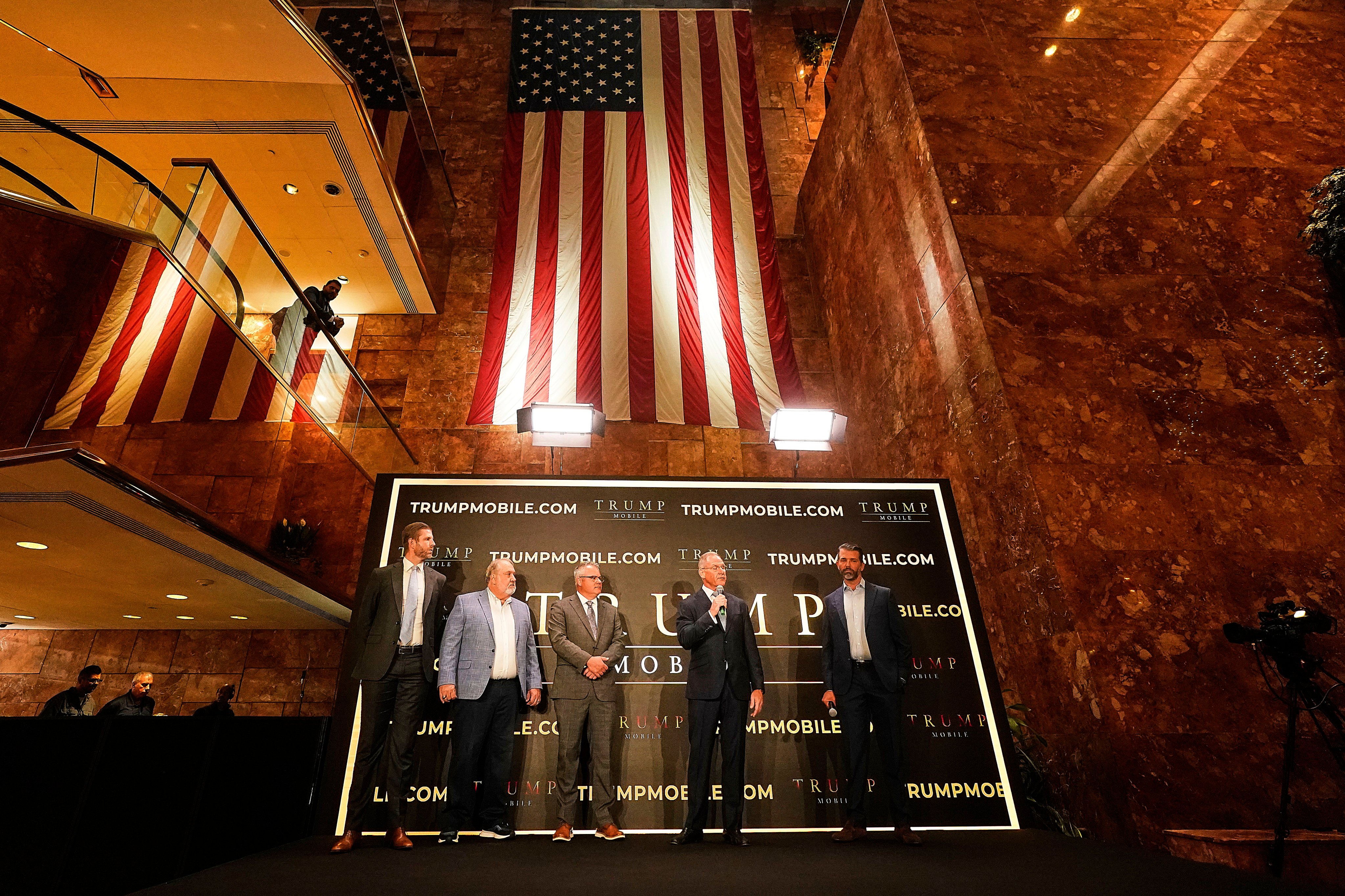 From left, Eric Trump, Don Hendrickson, Eric Thomas, Patrick O’Brien and Donald Trump Jnr take part in the announcement of Trump Mobile, in New York’s Trump Tower on Monday. Photo: AP