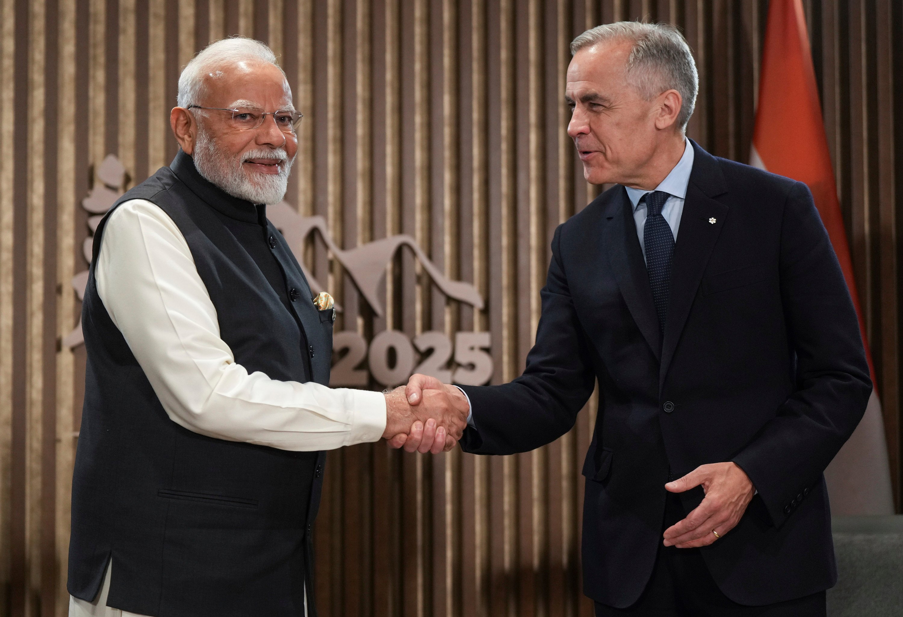 India’s Prime Minister Narendra Modi (left) and Canada’s Prime Minister Mark Carney shake hands during a meeting at the G7 Summit in Kananaskis, Alberta, on Tuesday. Photo: Canadian Press via AP