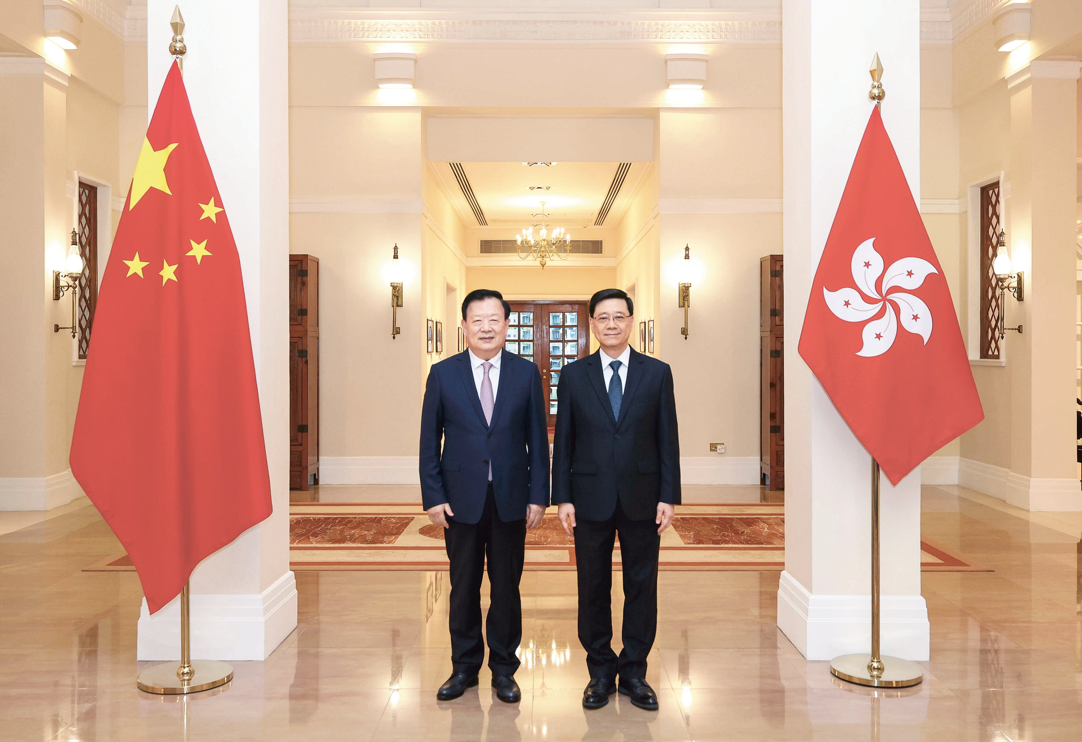 Xia Baolong (left) with Chief Executive John Lee at Government House. Photo: Handout