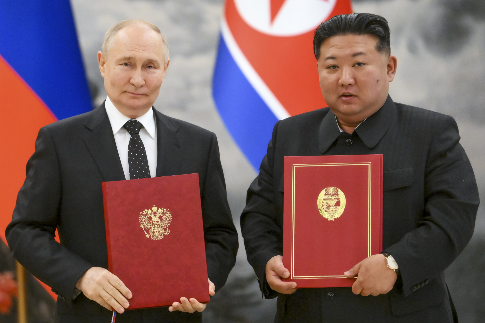 Russian President Vladimir Putin (left) and North Korean leader Kim Jong-un pose for a photo during the signing ceremony in June last year. Photo: Sputnik via AP Russian President Vladimir Putin (left) and North Korean leader Kim Jong-un pose for a photo during the signing ceremony in June last year. Photo: Sputnik via AP