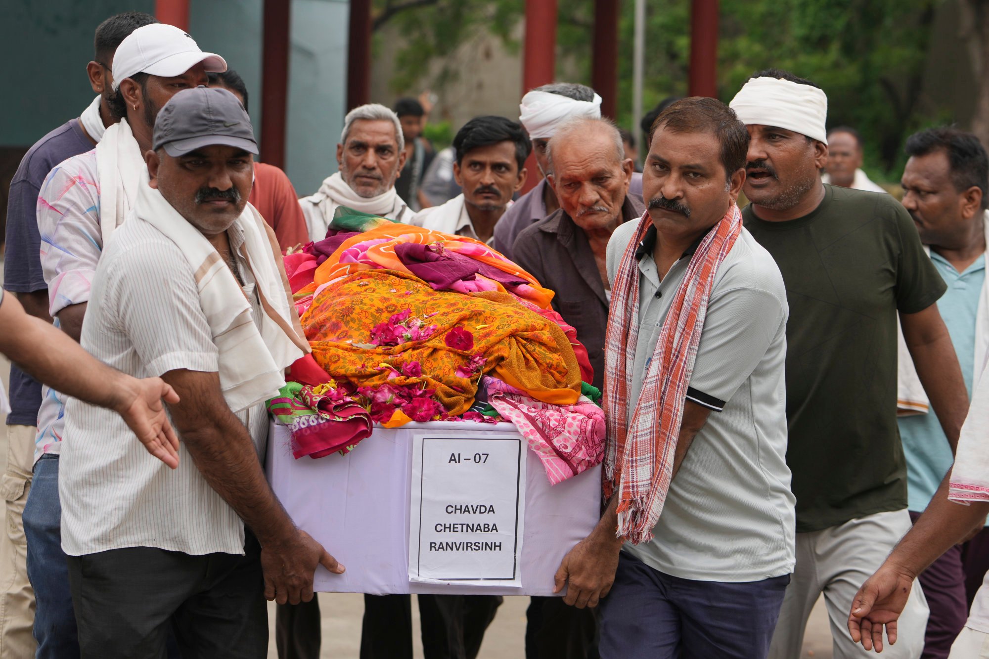 Relatives carry the coffin of Chetnaba Chavda, victim of the Air India plane crash, during her funeral at a crematorium in Ahmedabad, on Wednesday. Photo: AP Relatives carry the coffin of Chetnaba Chavda, victim of the Air India plane crash, during her funeral at a crematorium in Ahmedabad, on Wednesday. Photo: AP