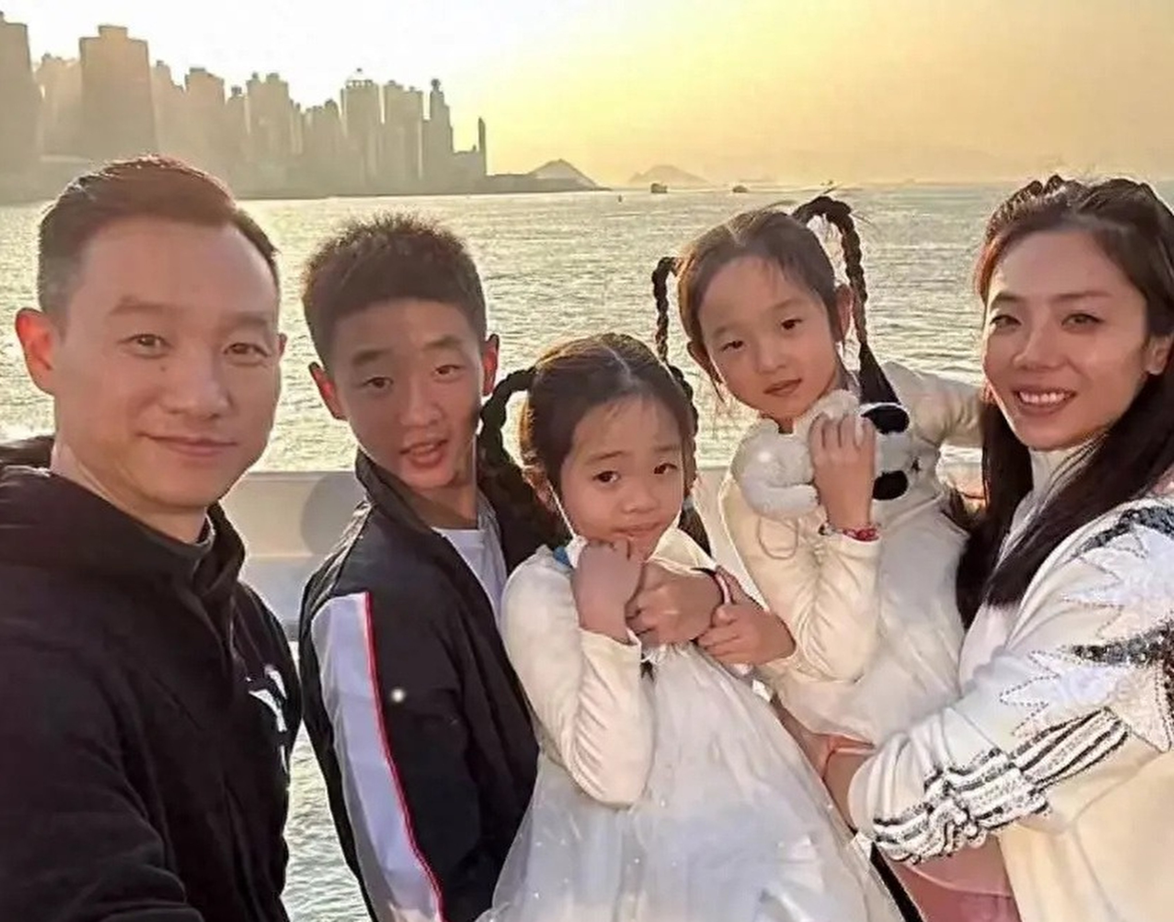(From left) Former Chinese gymnast Yang Wei with son Wenchang, twin daughters Yixin and Yirou, and wife Yun in Hong Kong. Photo: handout