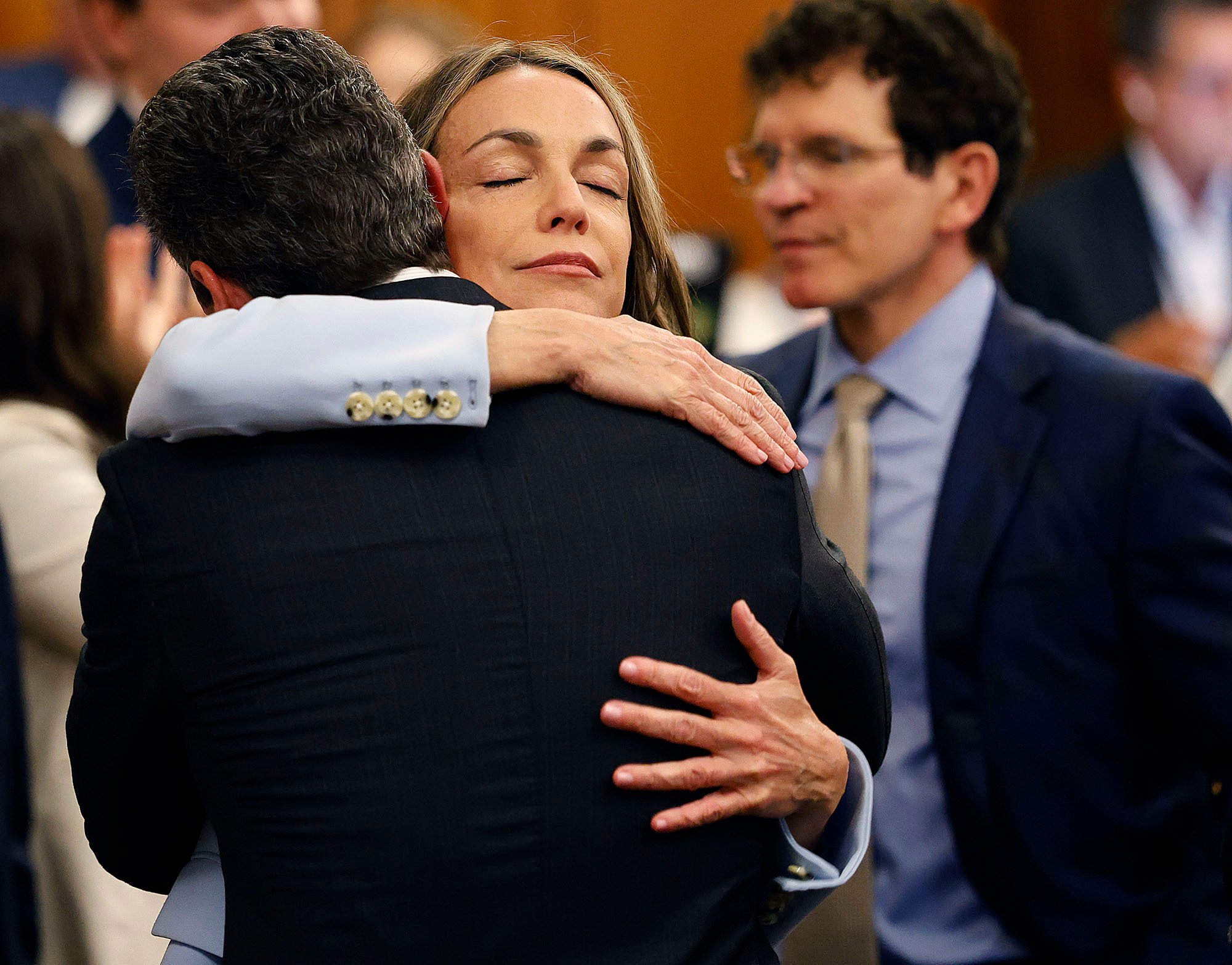 Karen Read hugs lawyer Alan Jackson after a not guilty verdict of was read in Norfolk Superior Court in Dedham, Massachusetts, on Wednesday. Photo: The Patriot Ledger via AP