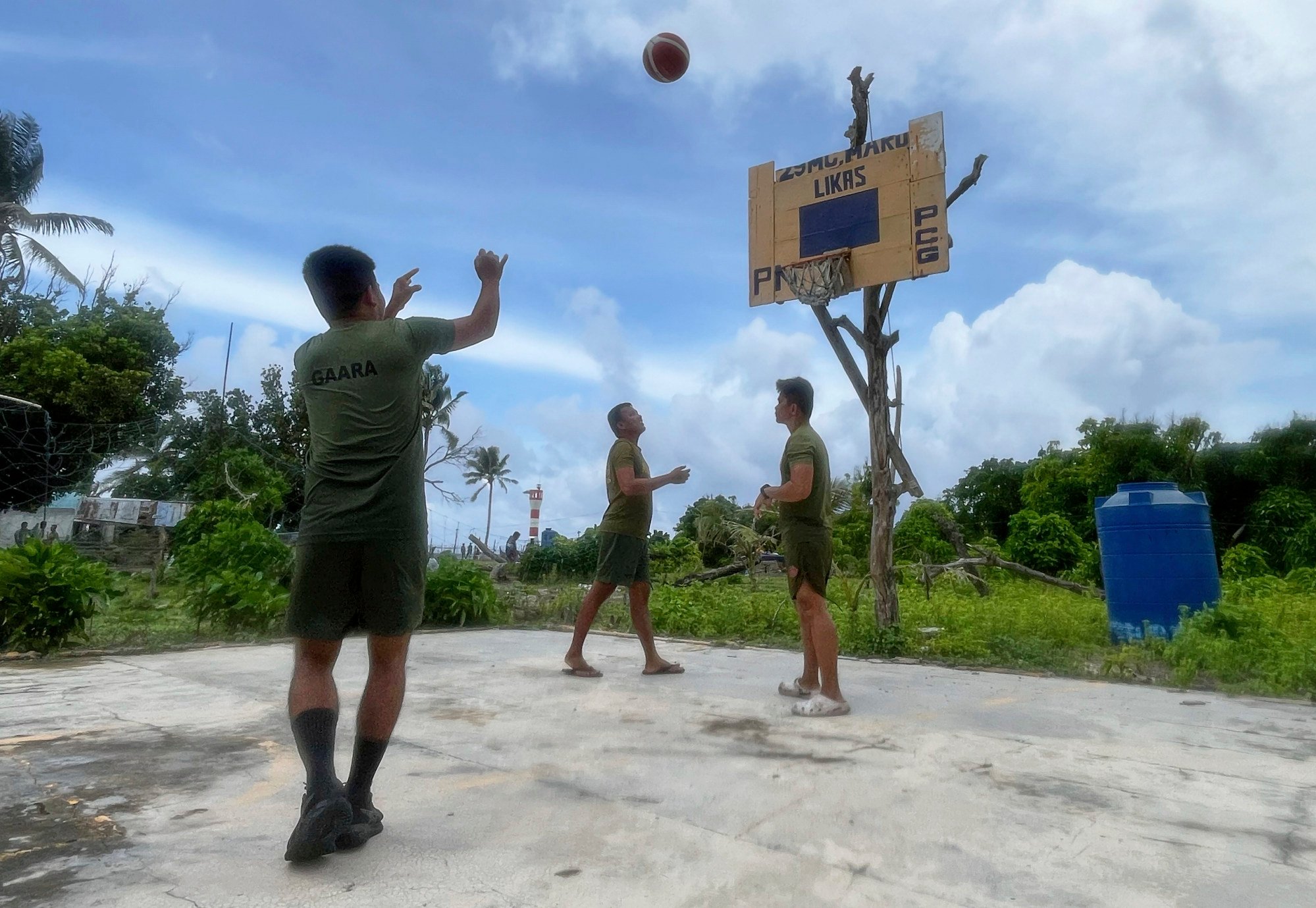 Philippine Marines play basketball at West York Island, locally called Likas Island, on one of the Philippine-occupied islands in the disputed South China Sea on June 5. Photo: AP Philippine Marines play basketball at West York Island, locally called Likas Island, on one of the Philippine-occupied islands in the disputed South China Sea on June 5. Photo: AP