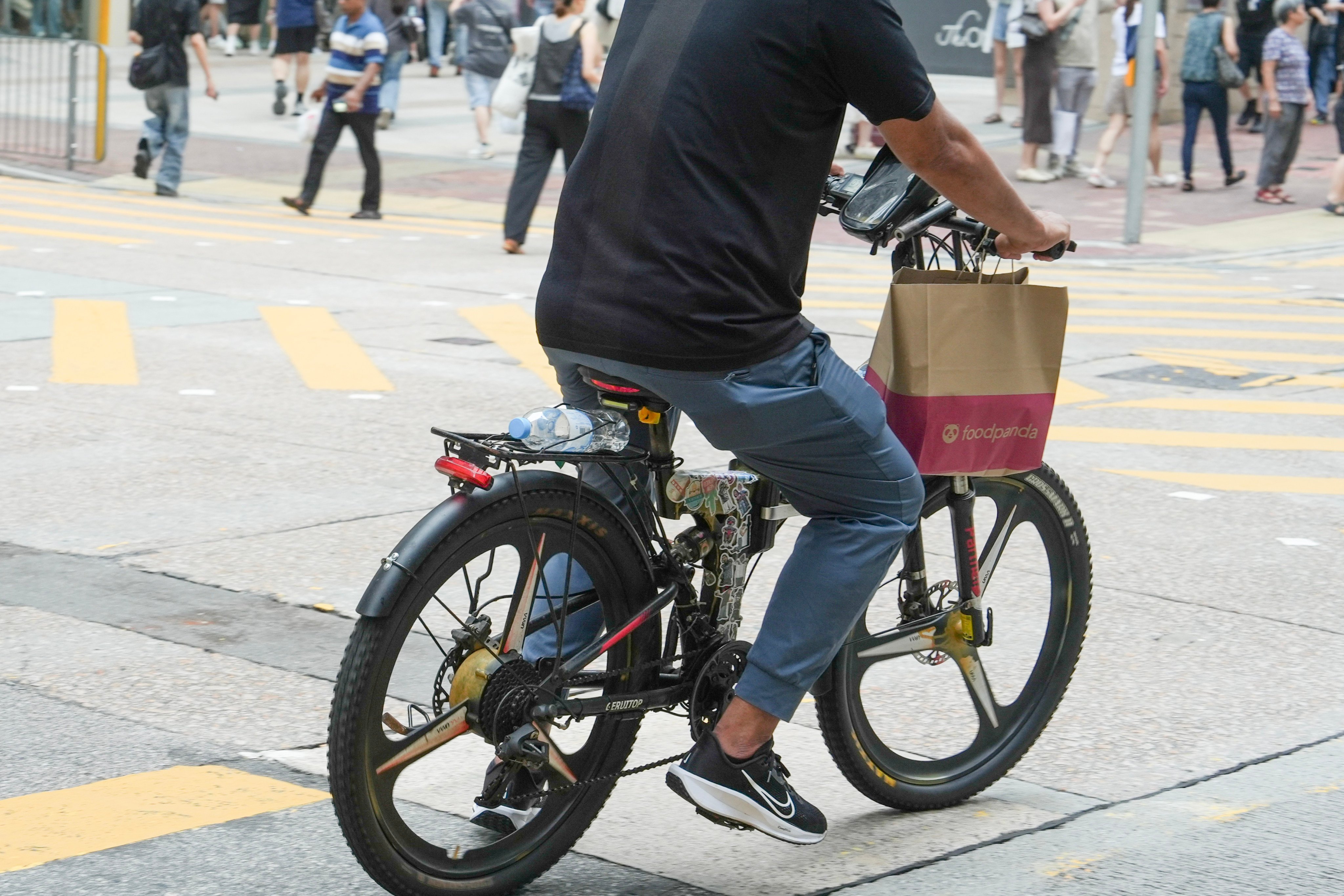 Many gig workers, such as those working for companies like Foodpanda, lack labour protections and benefits like sick leave. Photo: Sun Yeung