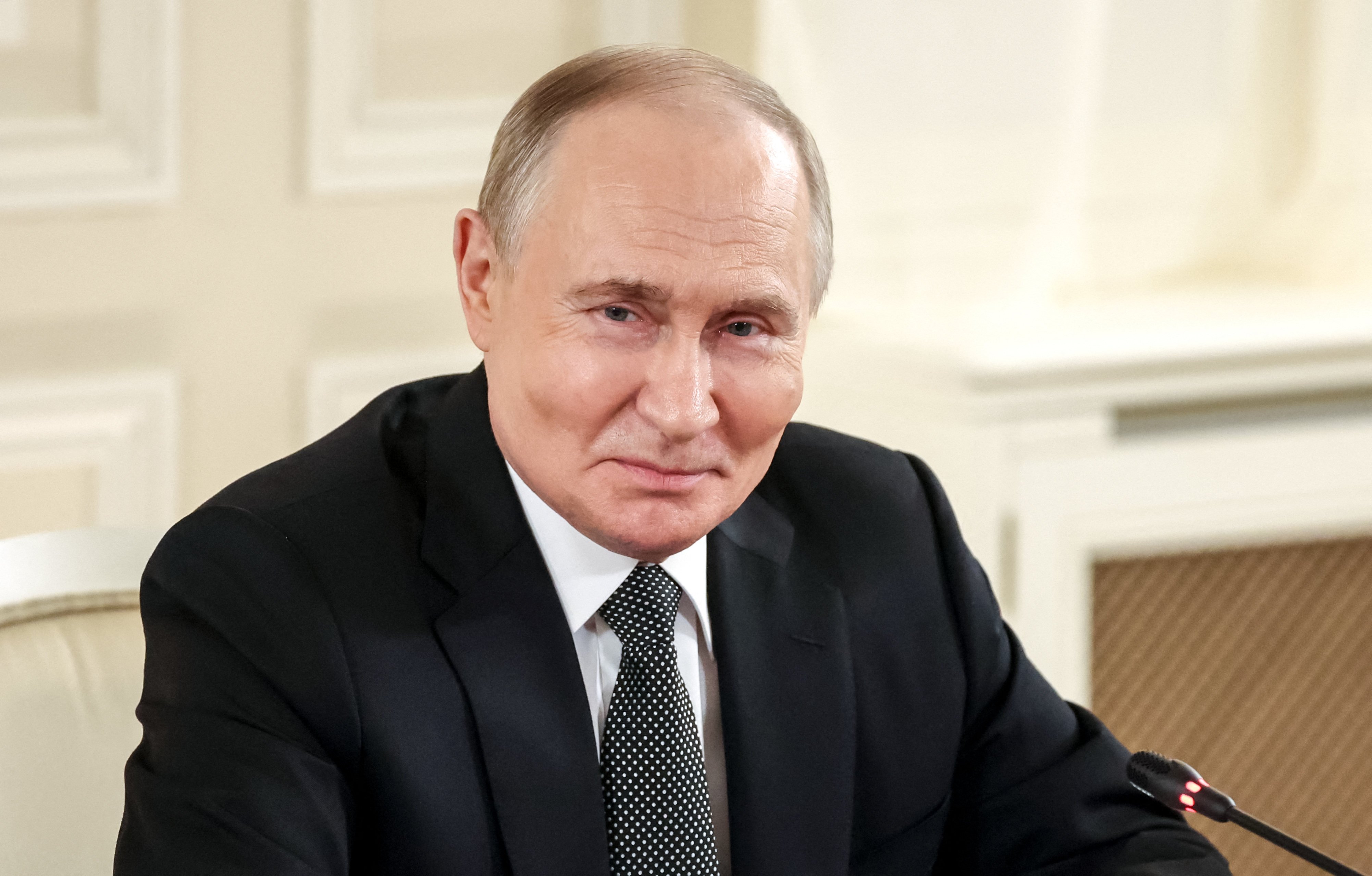 Russian President Vladimir Putin attends a meeting with representatives of international news agencies in St Petersburg on Wednesday. Photo: Sputnik via Reuters