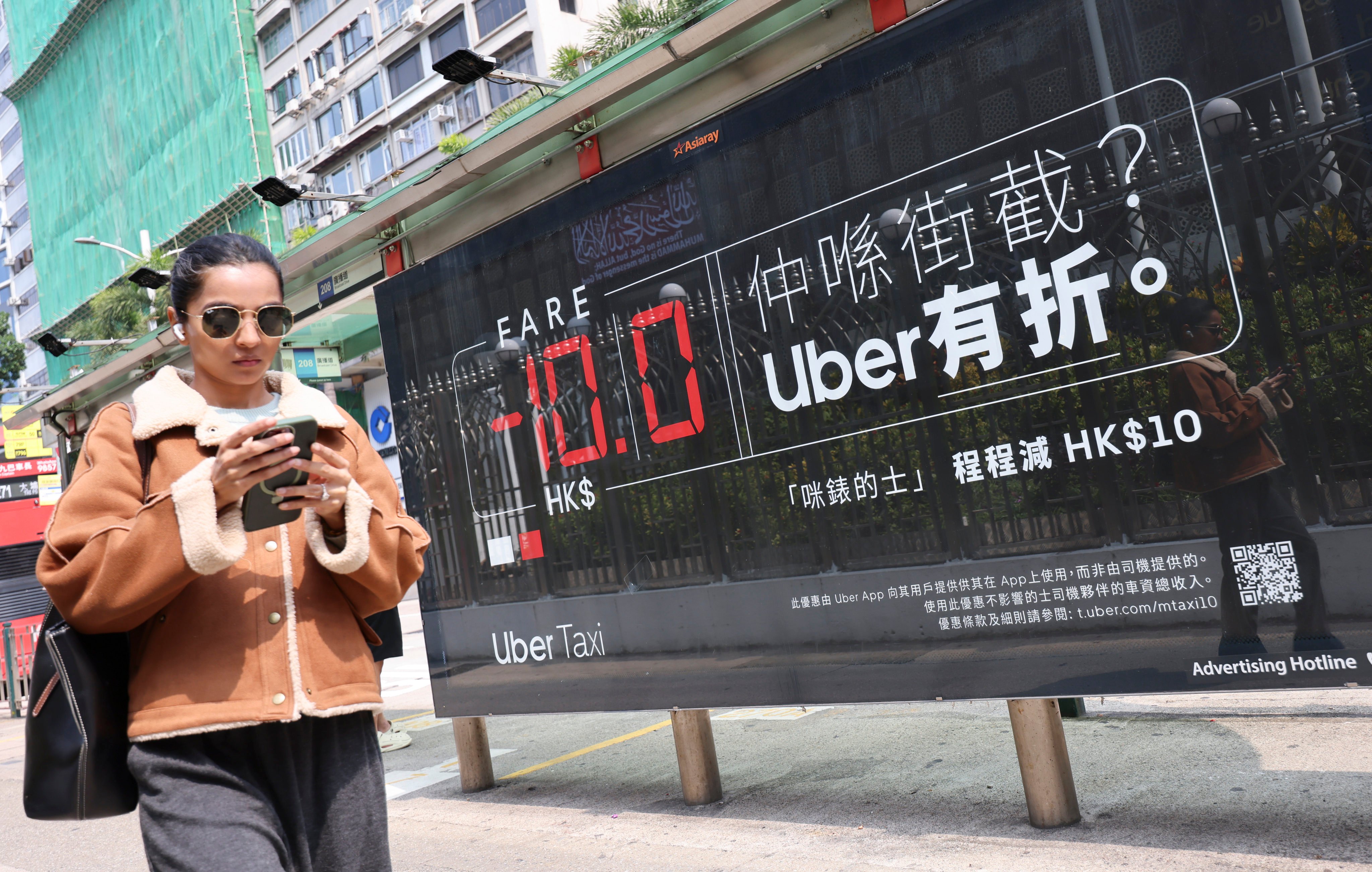 Uber has sent an email to its 1.5 million users and 30,000 drivers in Hong Kong, warning of possible higher fares and loss of income under new regulations proposed by the government. Photo: Jelly Tse