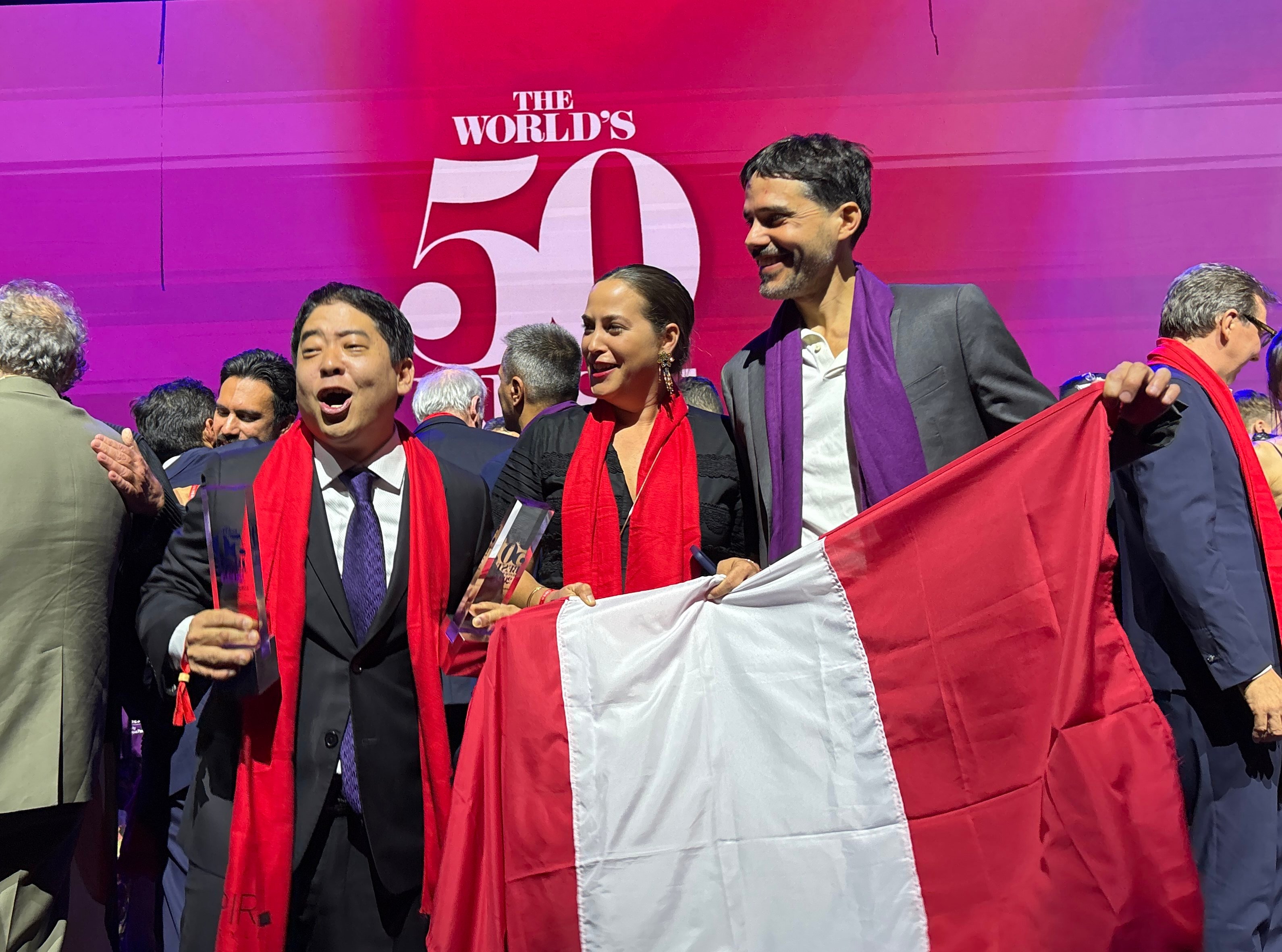 Mitsuharu “Micha” Tsumura (left) of Maido in Lima, Peru, celebrates his restaurant’s top ranking in the World’s 50 Best Restaurants 2025 list with fellow Lima restaurant representatives Pia Leon (centre) and Virgilio Martinez of Central, at the Auditorium Giovanni Agnelli in Turin, Italy, on June 19, 2025. Photo: Charmaine Mok