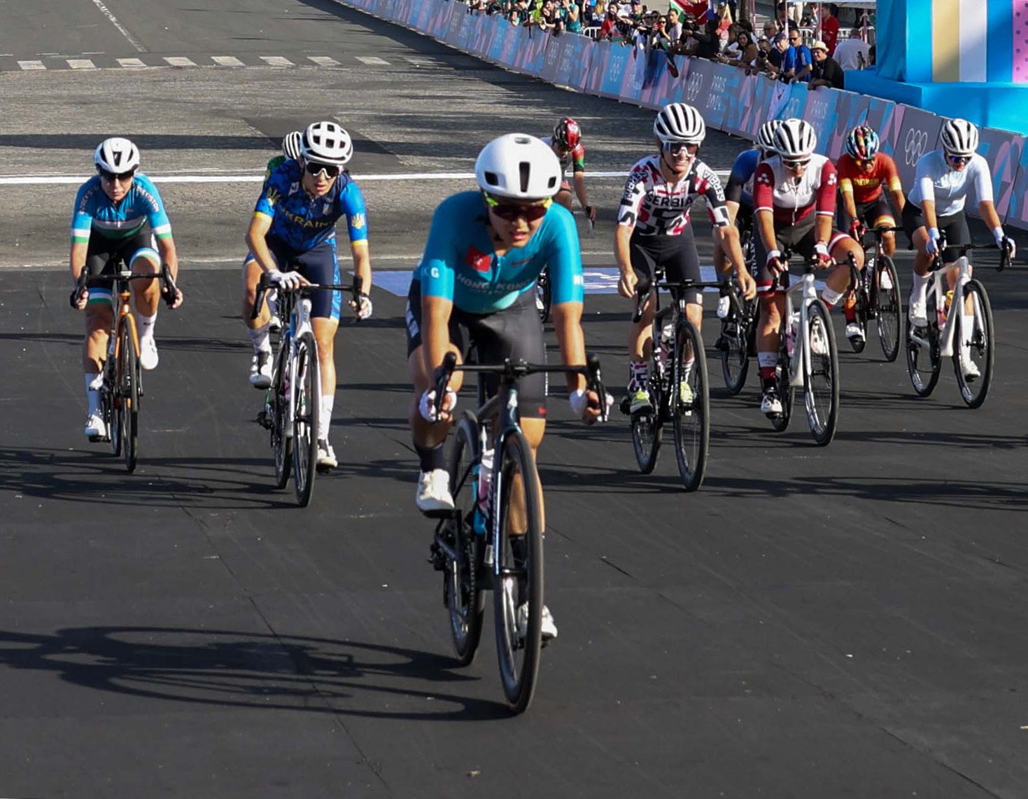 Ceci Lee (centre, in front) in road race action for Hong Kong. Photo: SF&OC