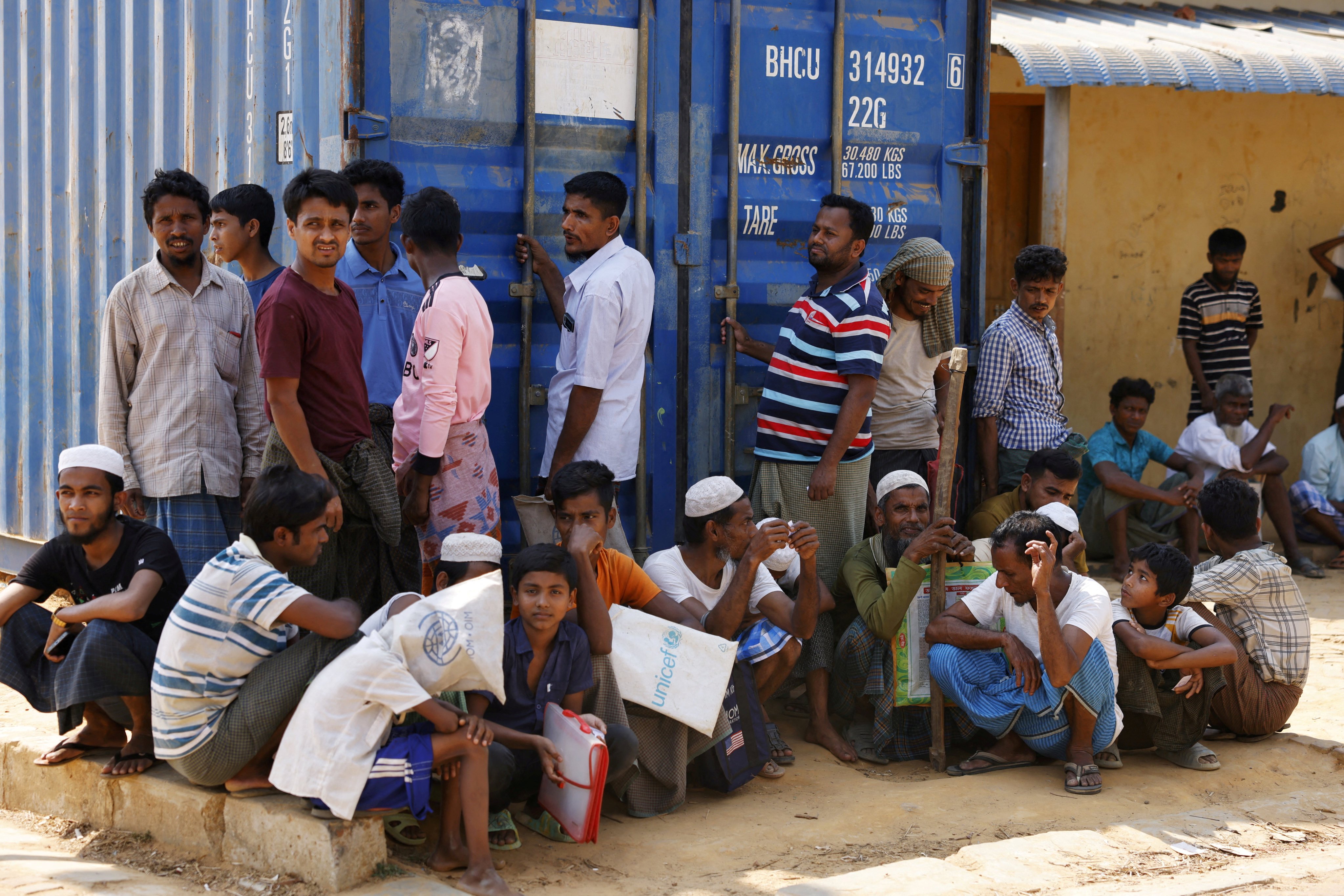 Rohingya refugees wait for relief supplies during Ramadan at the refugee camp in Cox’s Bazar, Bangladesh on March 16. Photo: Reuters