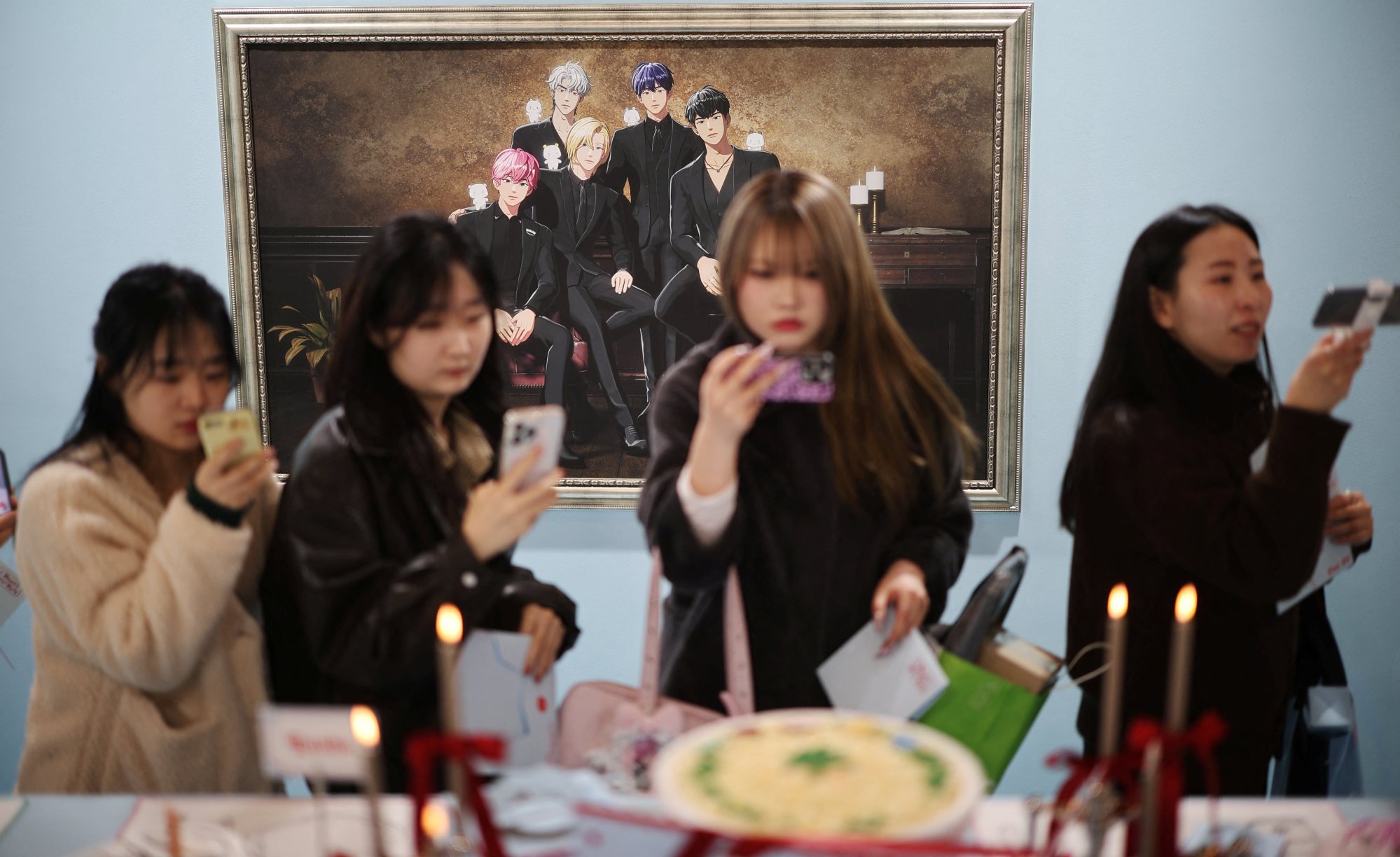 Fans of virtual K-pop boy band Plave look around a pop-up store in Seoul, South Korea, on March 7. Photo: Reuters Fans of virtual K-pop boy band Plave look around a pop-up store in Seoul, South Korea, on March 7. Photo: Reuters