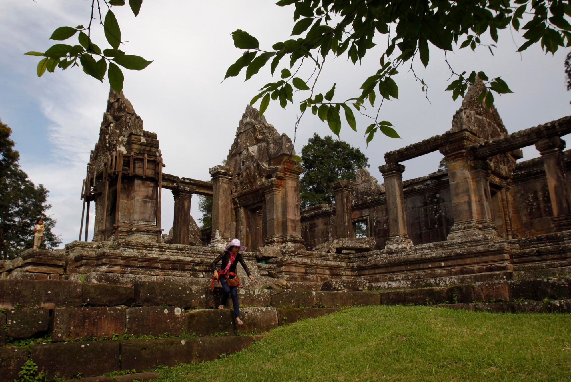 A woman visits Cambodia’s Preah Vihear temple, near the disputed border with Thailand, in Preah Vihear province. The ICJ has ruled that the temple belongs to Cambodia. Photo: AP A woman visits Cambodia’s Preah Vihear temple, near the disputed border with Thailand, in Preah Vihear province. The ICJ has ruled that the temple belongs to Cambodia. Photo: AP