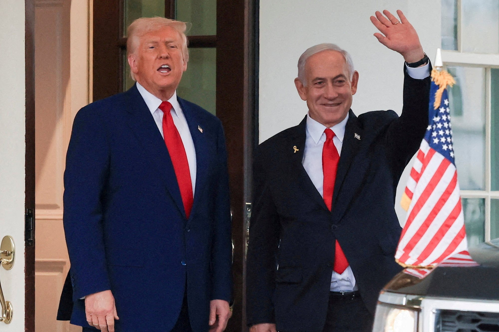 US President Donald Trump speaks as Israeli Prime Minister Benjamin Netanyahu waves following a meeting at the White House in April. Photo: Reuters
