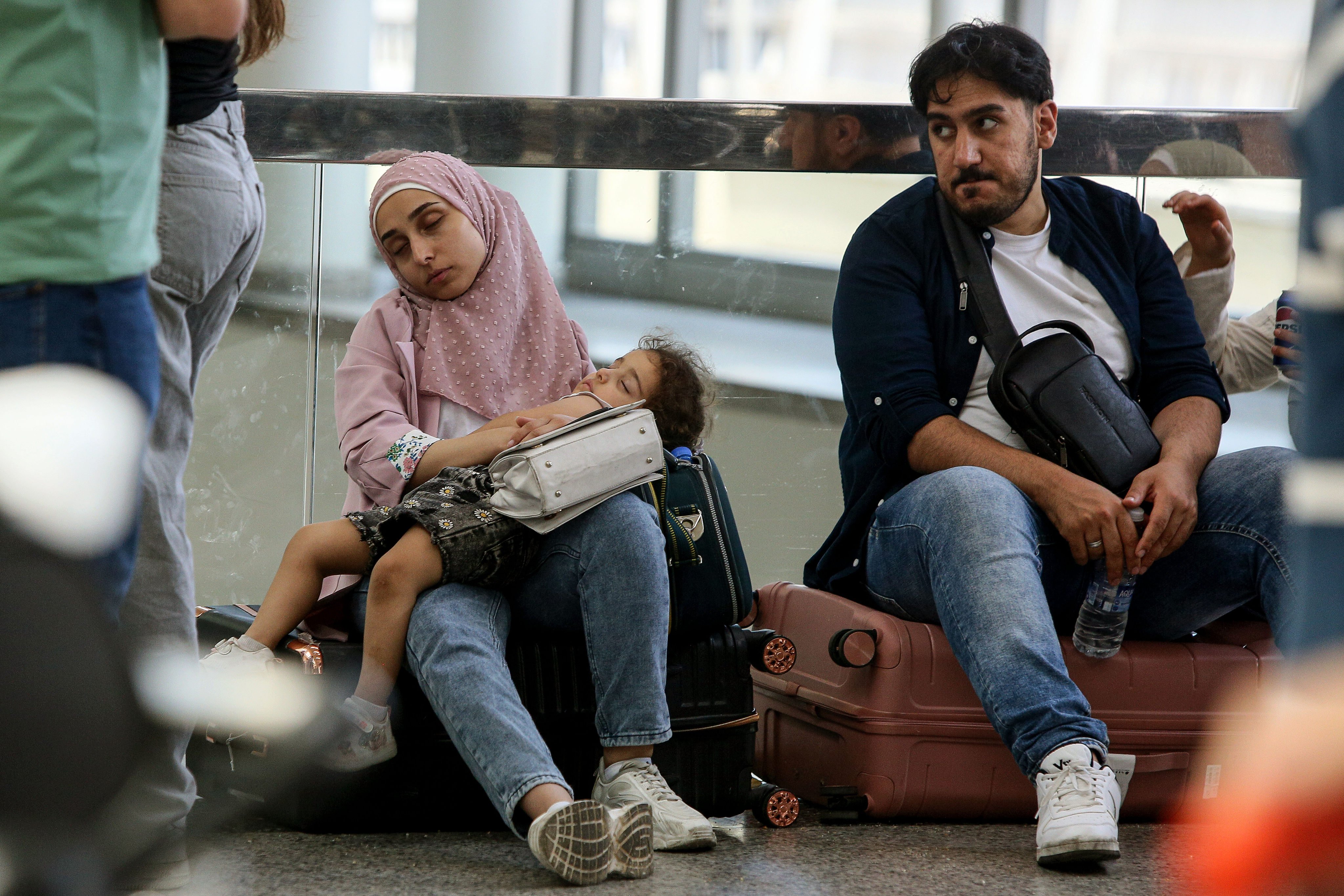 Stranded passengers wait in the departure lounge of an airport in Lebanon on June 13. Photo: dpa