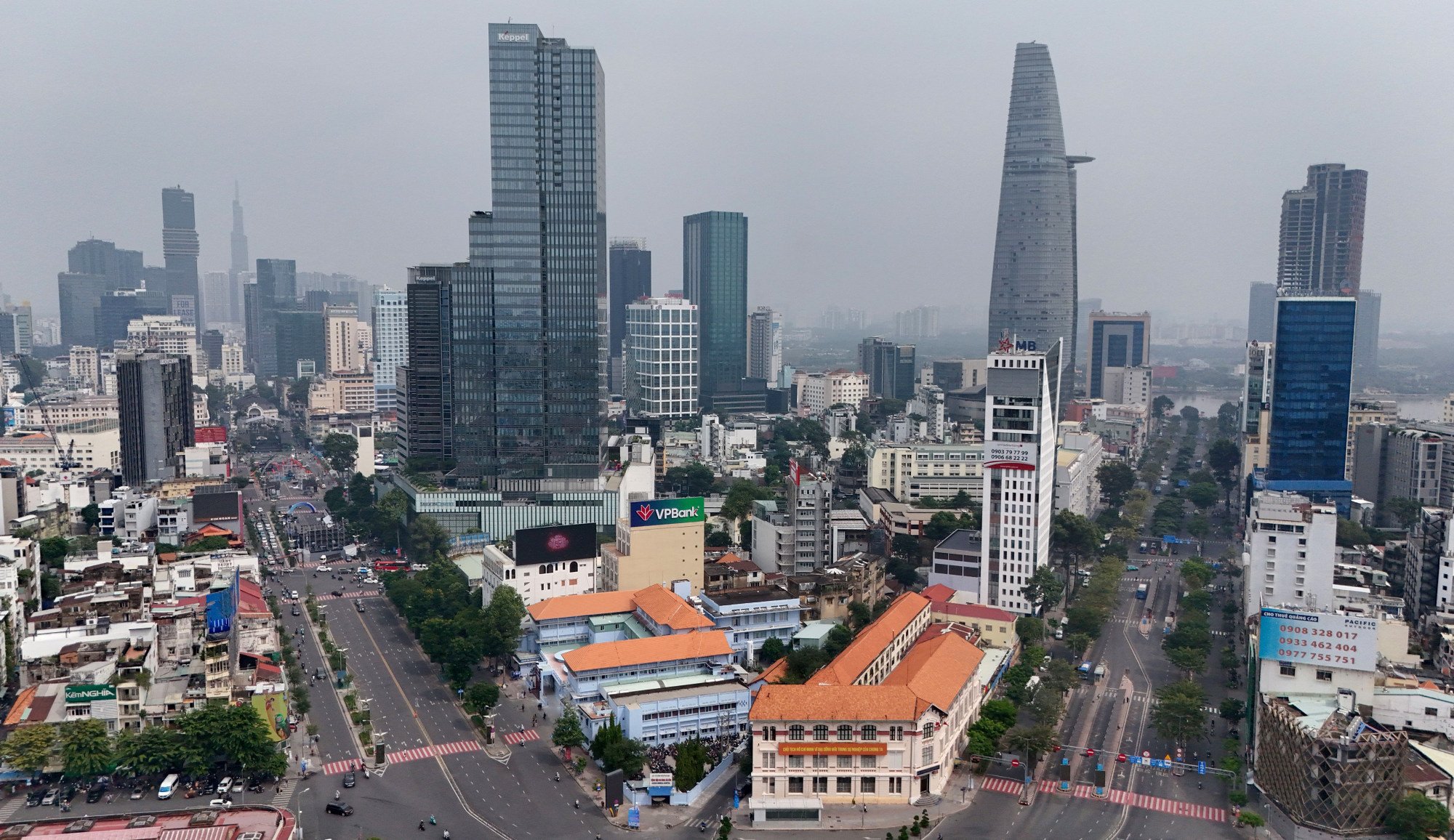 An aerial view of historic low-rise properties in front of high-rise commercial buildings in Ho Chi Minh City. Photo: AFP