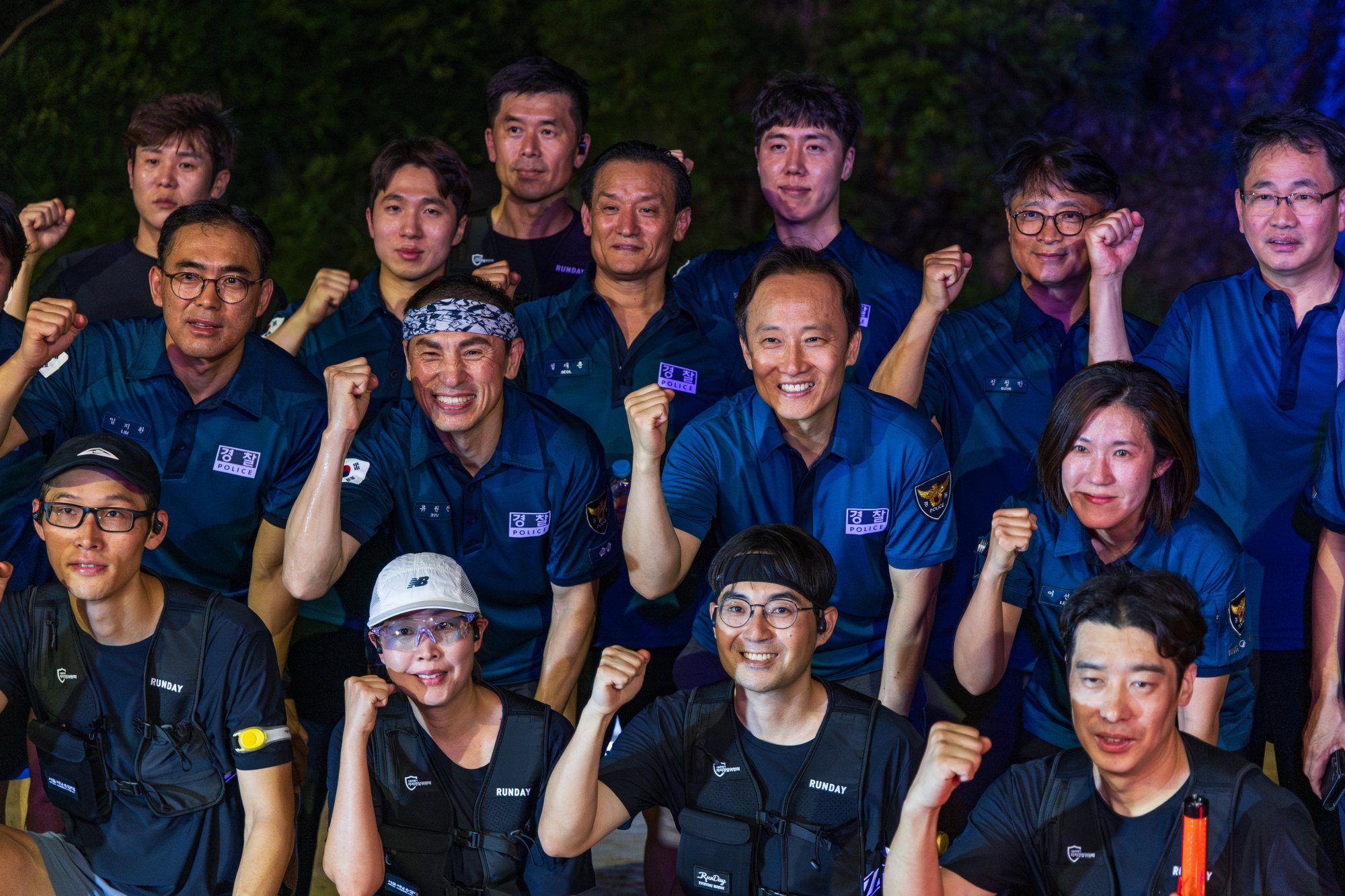 Members of the Be Ready Running Club pose for a photo with police officers after completing a task along a stream in northwestern Seoul, as part of the city’s Running Patrol programme. Photo: Kim Jung-yeop