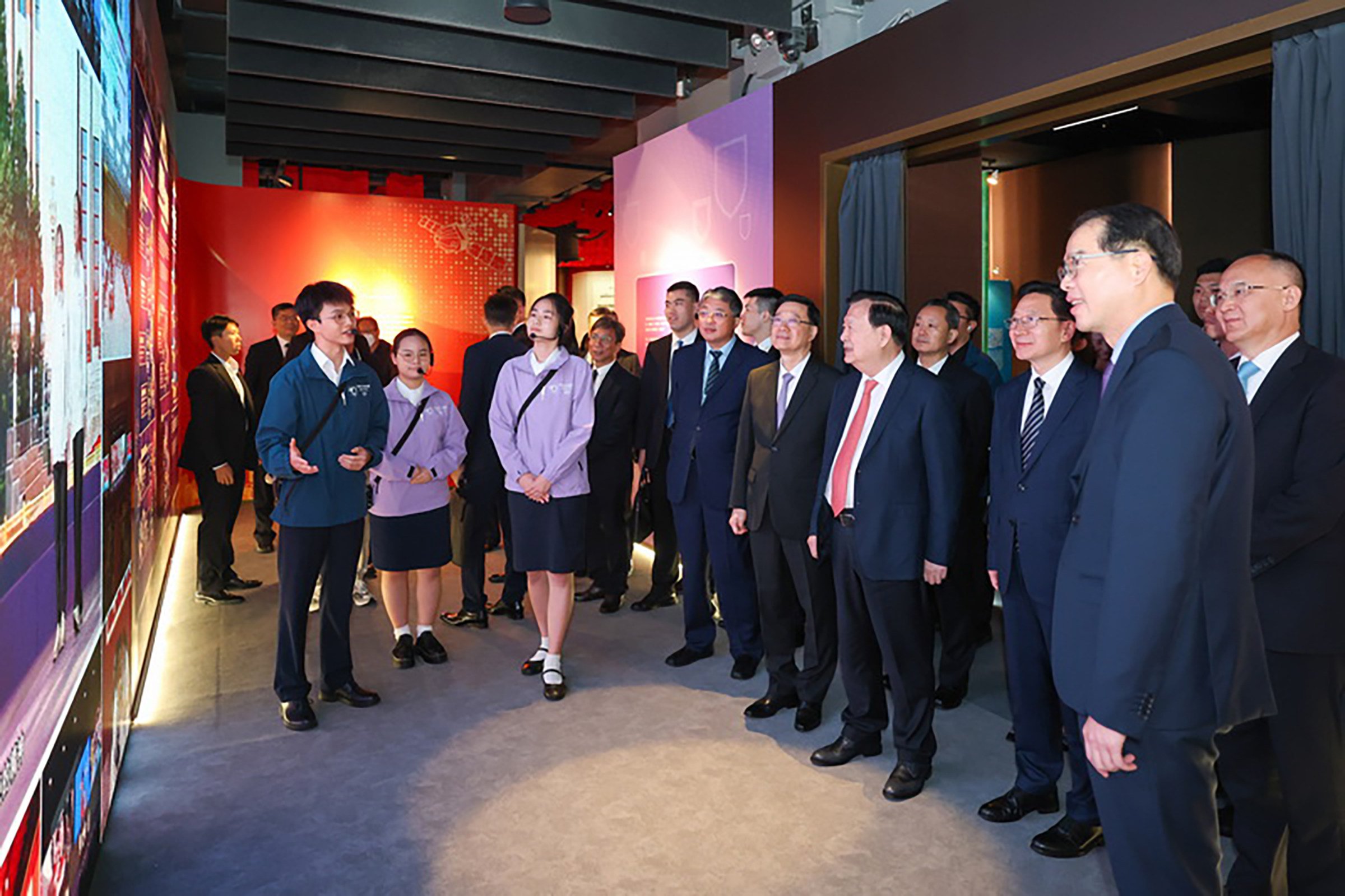Xia Baolong (fourth from right), director of the Hong Kong and Macau Affairs Office, visits an exhibition on the national security law at the Hong Kong Museum of History, along with city leader John Lee Ka-chiu (on Xia’s right). Photo: Handout