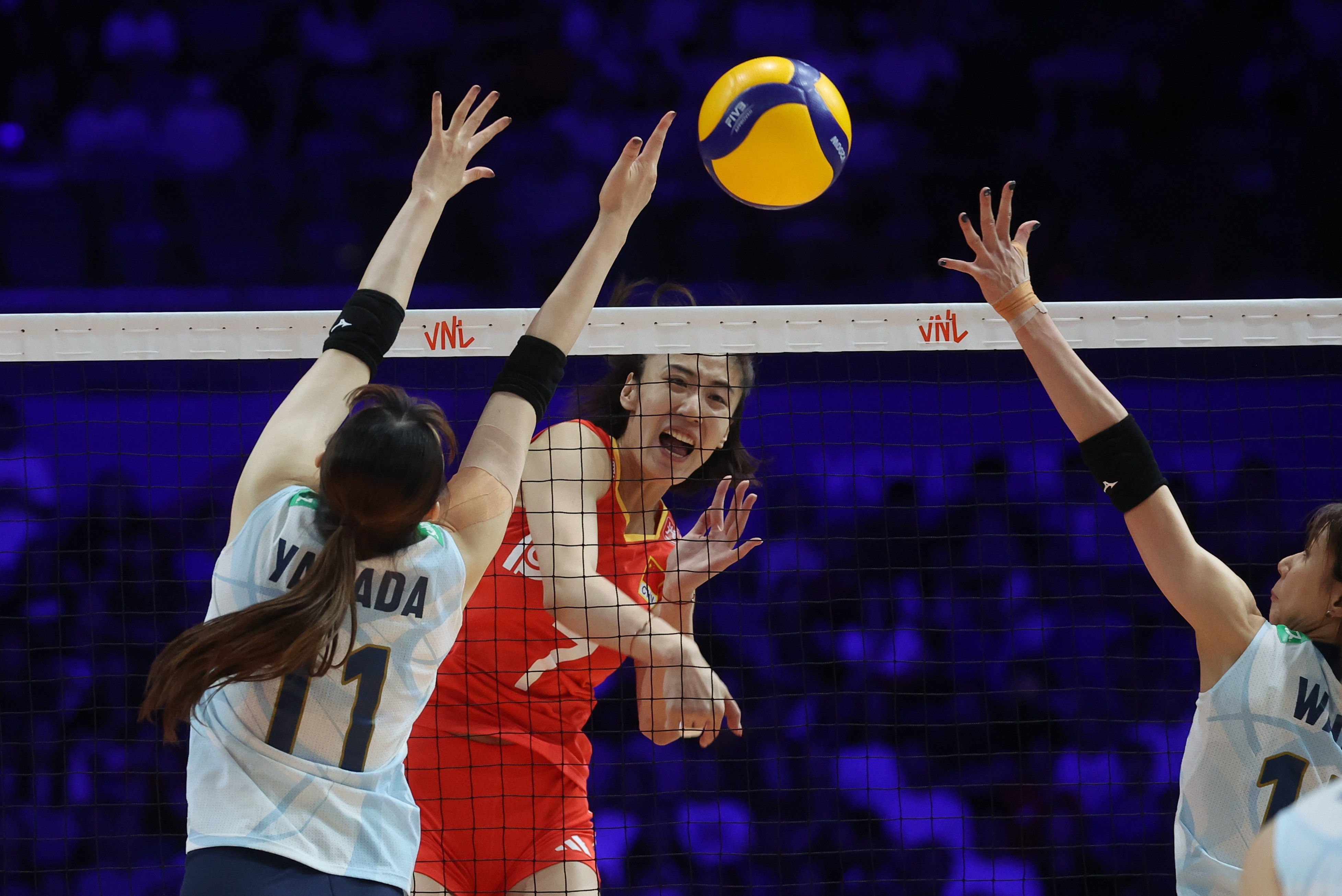 China’s Wang Yuanyuan (centre) goes on the attack during her side’s Women’s Volleyball Nations League clash with Japan. Photo: Edmond So