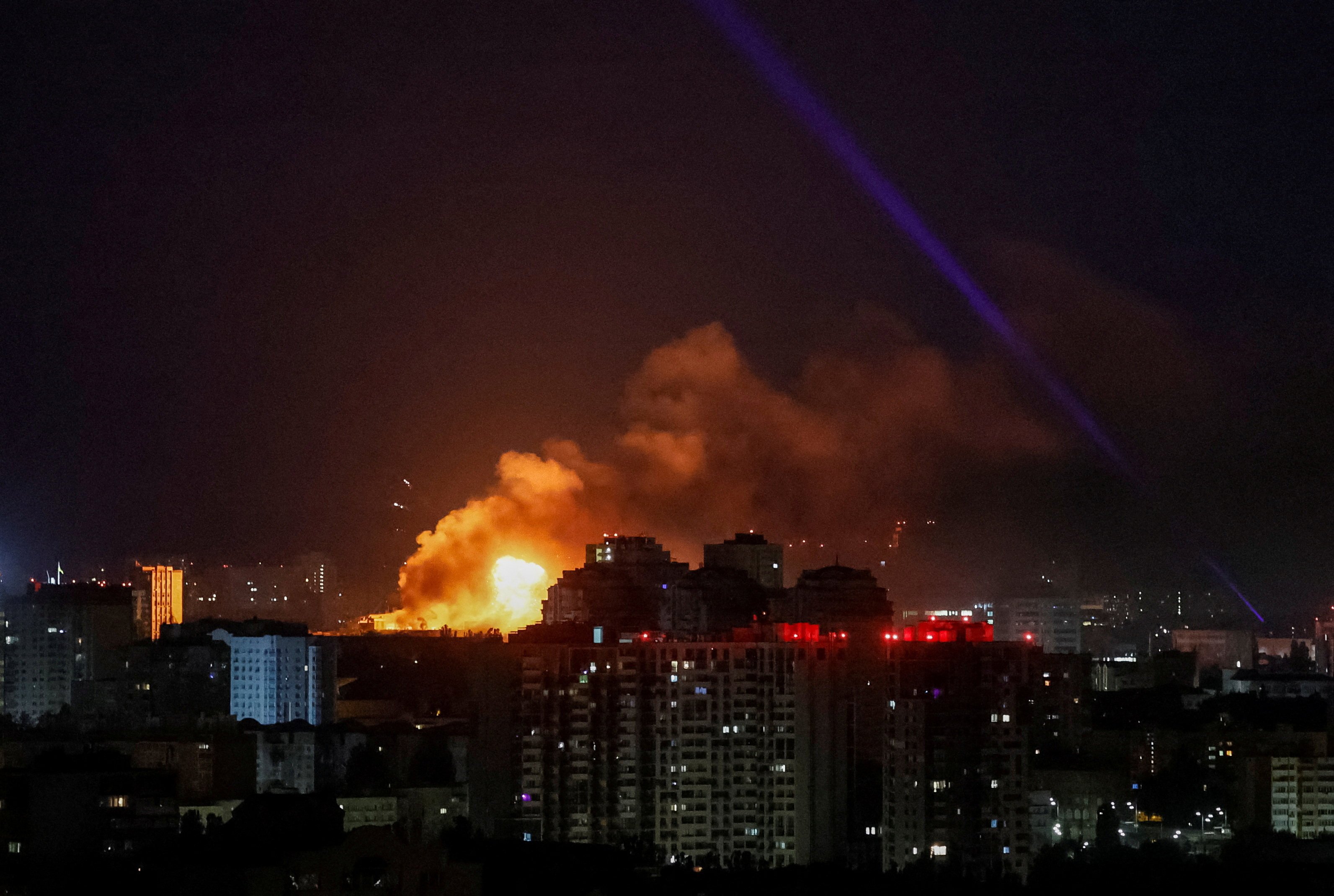 An explosion lights up the sky over Kyiv during a Russian drone strike on Tuesday. Photo: Reuters