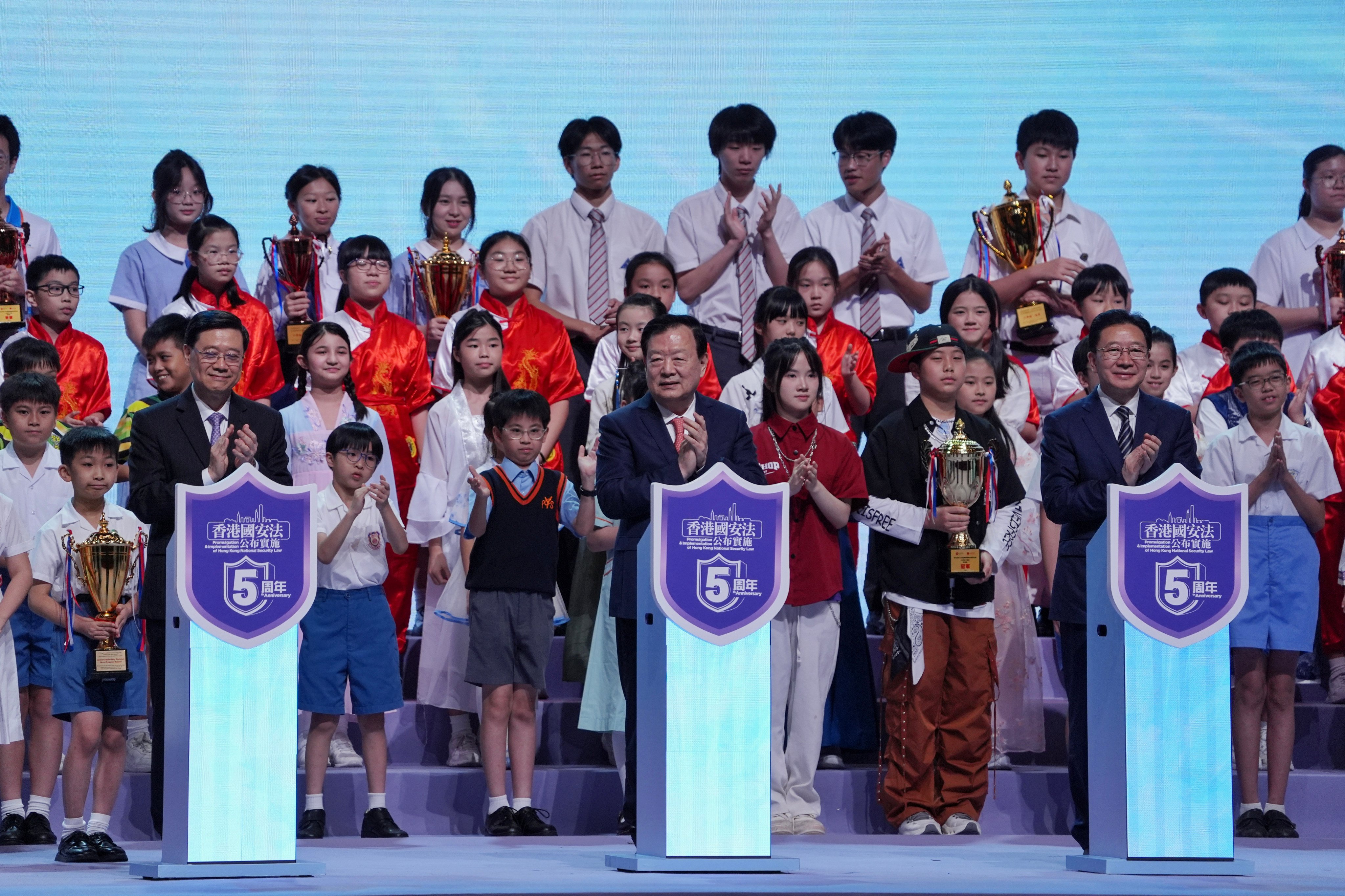 Xia Baolong (centre) at the high-level forum held in Hong Kong on the fifth anniversary of the Beijing-imposed national security law, flanked by city leader John Lee (left) and Beijing’s liaison office chief in Hong Kong, Zhou Ji. Photo: Elson Li