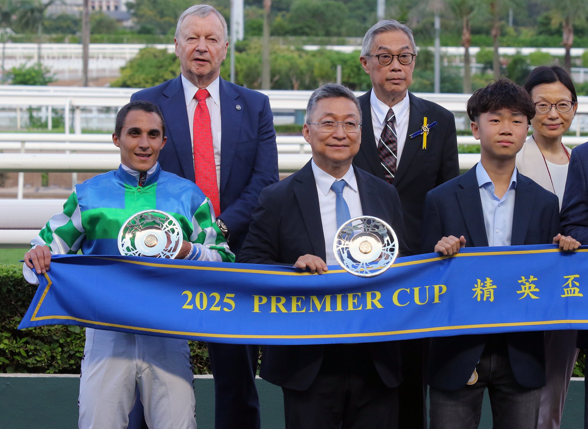 It was all smiles for jockey Keagan de Melo and trainer Francis Lui (centre). It was all smiles for jockey Keagan de Melo and trainer Francis Lui (centre).
