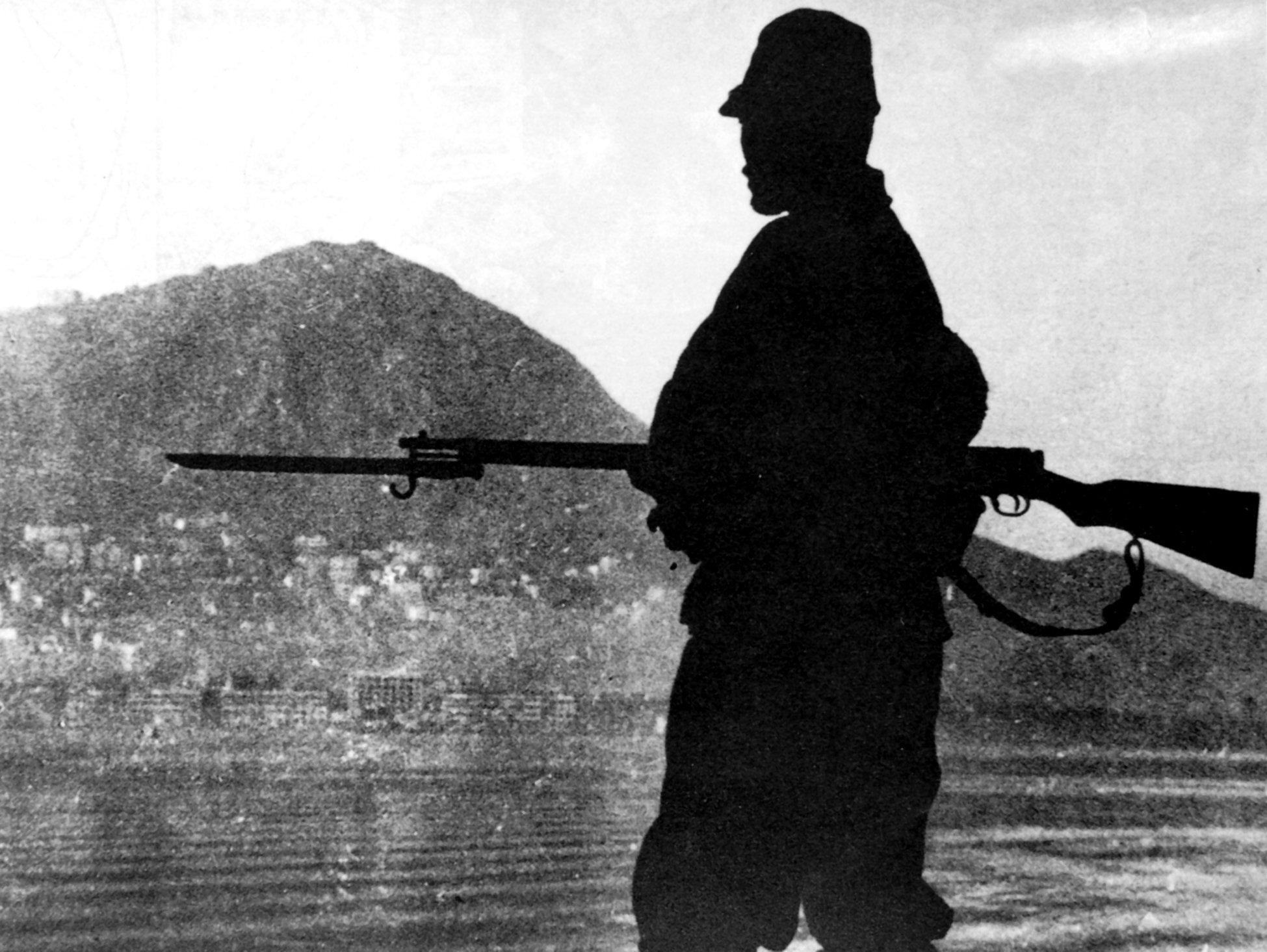 A Japanese soldier looks at Central from Tsim Sha Tsui during the war. Photo: Hong Kong Museum of History