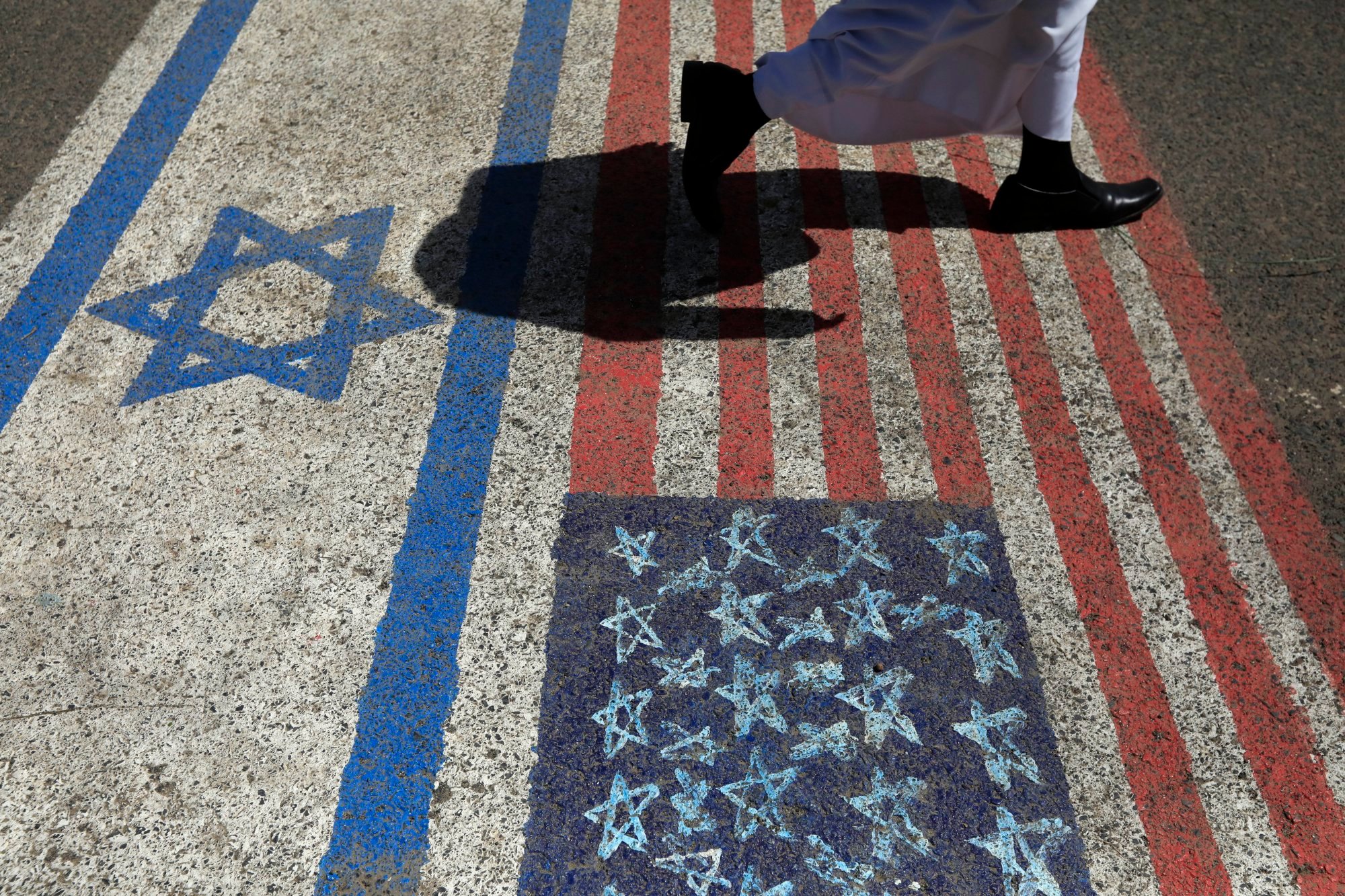 A Houthi supporter steps on US and Israel flags during a protest in Sana’a, Yemen, in 2024. Photo: EPA-EFE A Houthi supporter steps on US and Israel flags during a protest in Sana’a, Yemen, in 2024. Photo: EPA-EFE