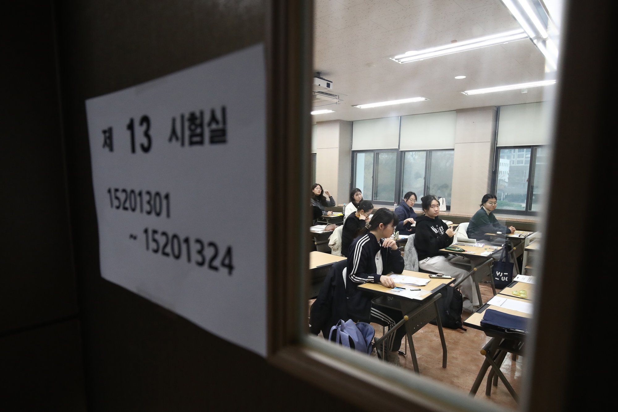 Students wait to take the annual university entrance exam at a school in Seoul in 2023. The country’s fiercely competitive college entrance system has been criticised for pushing children too hard. Photo: EPA-EFE Students wait to take the annual university entrance exam at a school in Seoul in 2023. The country’s fiercely competitive college entrance system has been criticised for pushing children too hard. Photo: EPA-EFE