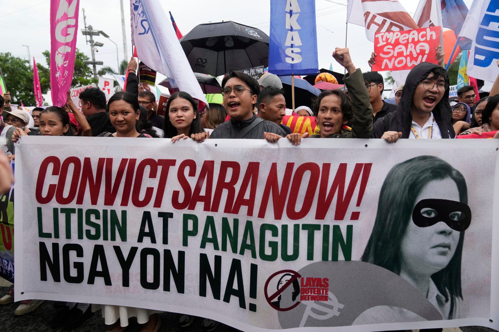 Protesters call for the impeachment trial against Philippine Vice-President Sara Duterte-Carpio to proceed at a rally in Pasay on June 11. Photo: AP Protesters call for the impeachment trial against Philippine Vice-President Sara Duterte-Carpio to proceed at a rally in Pasay on June 11. Photo: AP